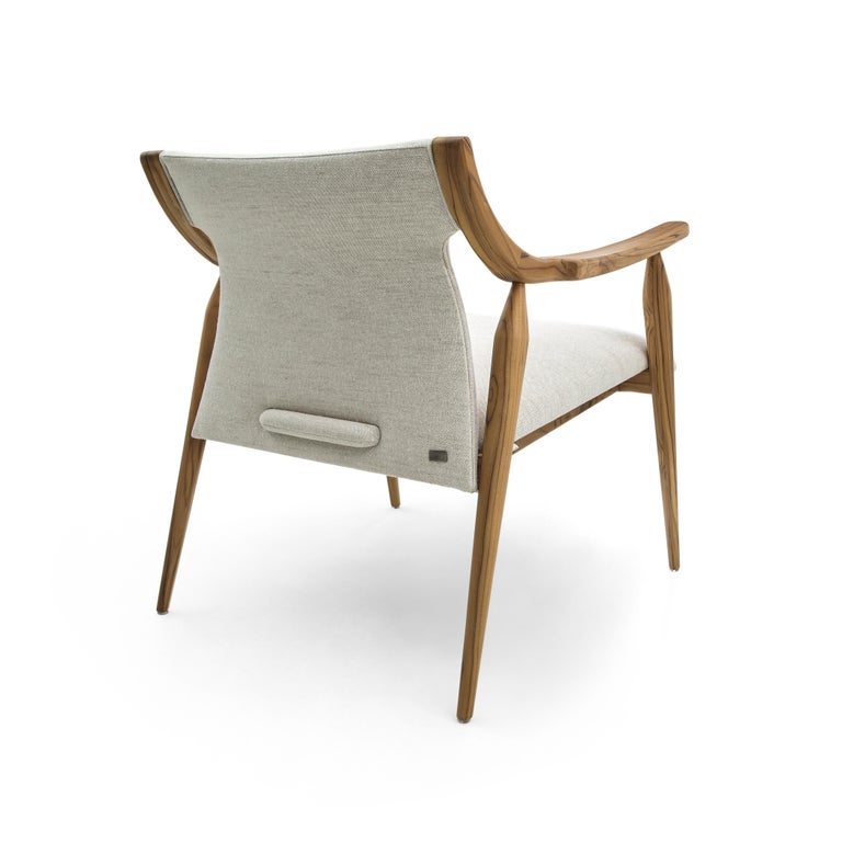 https://a.1stdibscdn.com/mince-armchair-featuring-curved-arms-and-spindle-legs-in-teak-for-sale-picture-7/f_52822/f_329319821677161357482/50103696_POLTRONA_MAD_9806_MINCE_148MT_2316_A_EXP_08_master.JPG?width=768