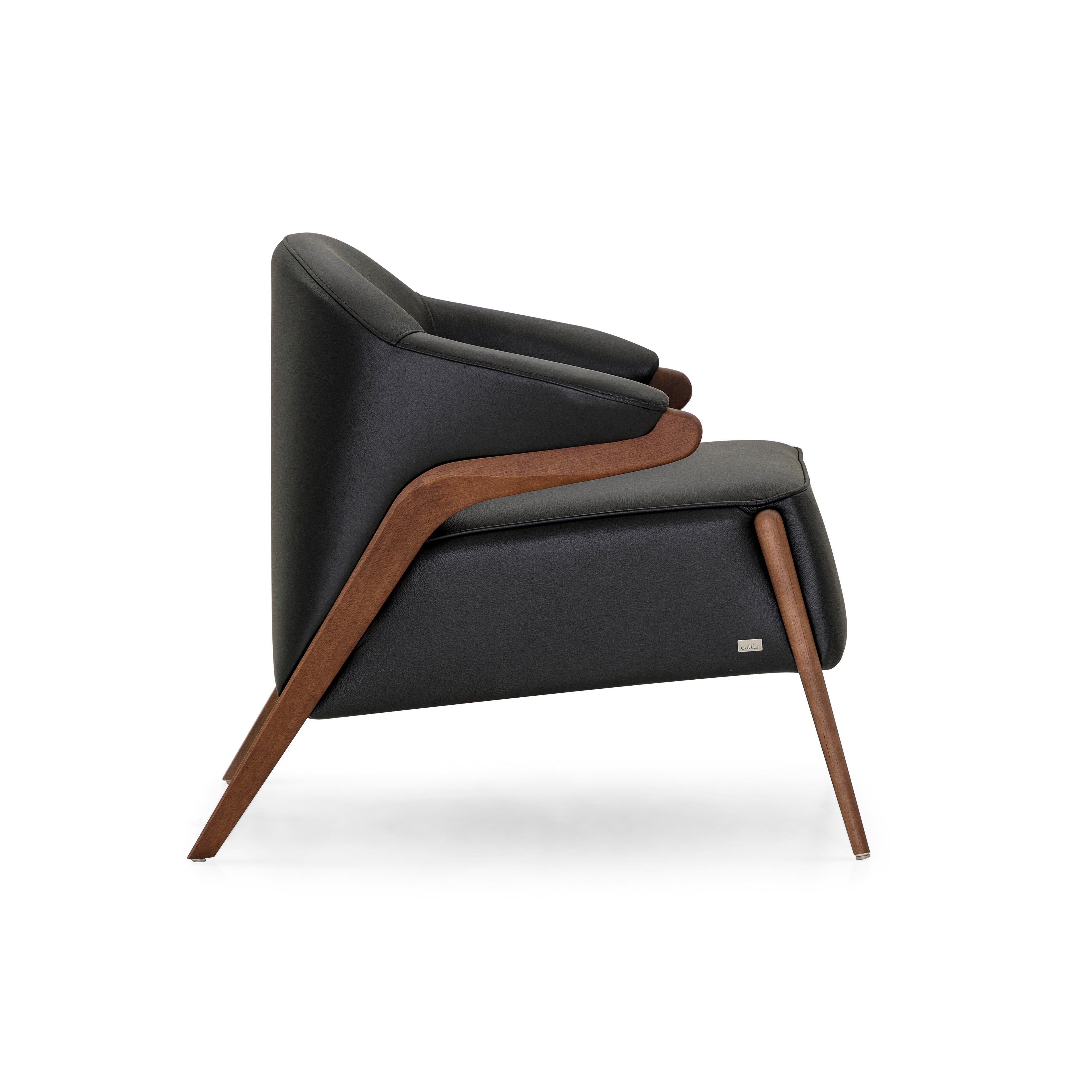 https://a.1stdibscdn.com/osa-upholstered-curve-back-armchair-in-walnut-finish-and-black-leather-for-sale-picture-2/f_52822/f_270722621643149636803/50115299_Osa_MH9401_149_934_3_master.JPG