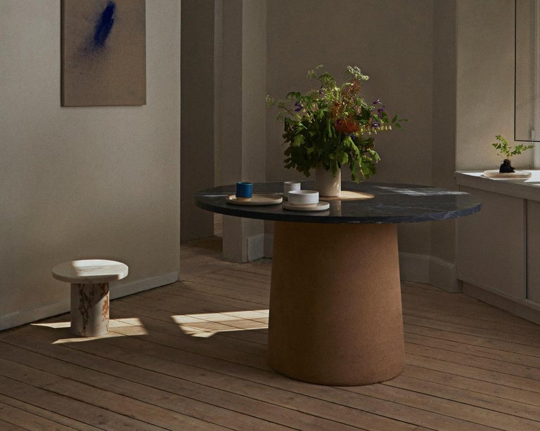 https://a.1stdibscdn.com/contemporary-sintra-dining-table-with-black-marble-and-natural-cork-for-sale-picture-6/f_36781/f_117761111534507193432/511_2a115ebbc8_sintra_dining_context_1_Full_5_4_master.jpg?width=768