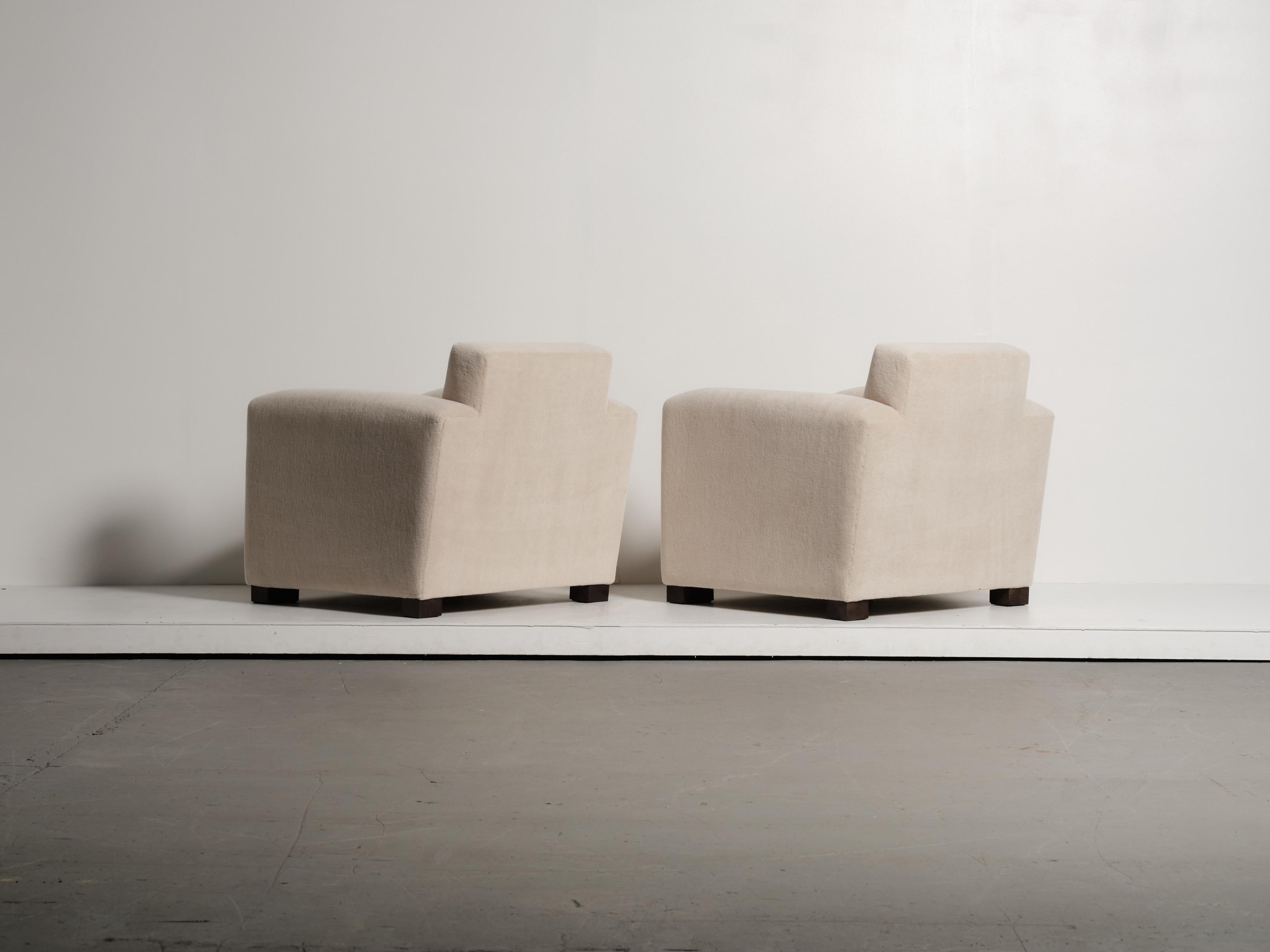 https://a.1stdibscdn.com/a-pair-of-club-chairs-upholstered-in-ivory-pure-alpaca-for-sale-picture-7/f_22593/f_486239021770063205853/51_Adnet_Style_Alpaca_SA03_1_26_0117_master.jpg