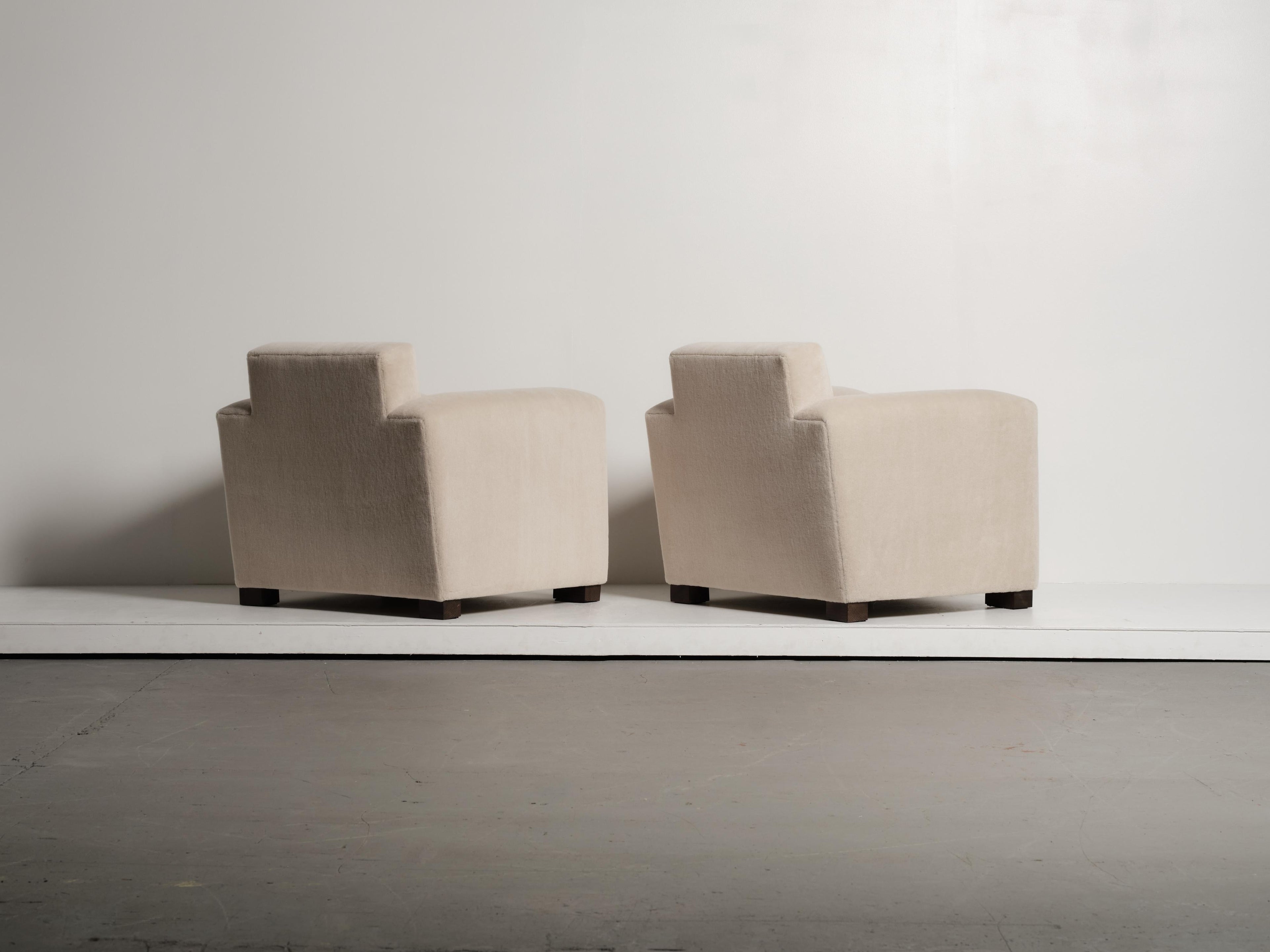 https://a.1stdibscdn.com/a-pair-of-club-chairs-upholstered-in-ivory-pure-alpaca-for-sale-picture-9/f_22593/f_486239021770063206703/51_Adnet_Style_Alpaca_SA03_1_26_0120_master.jpg