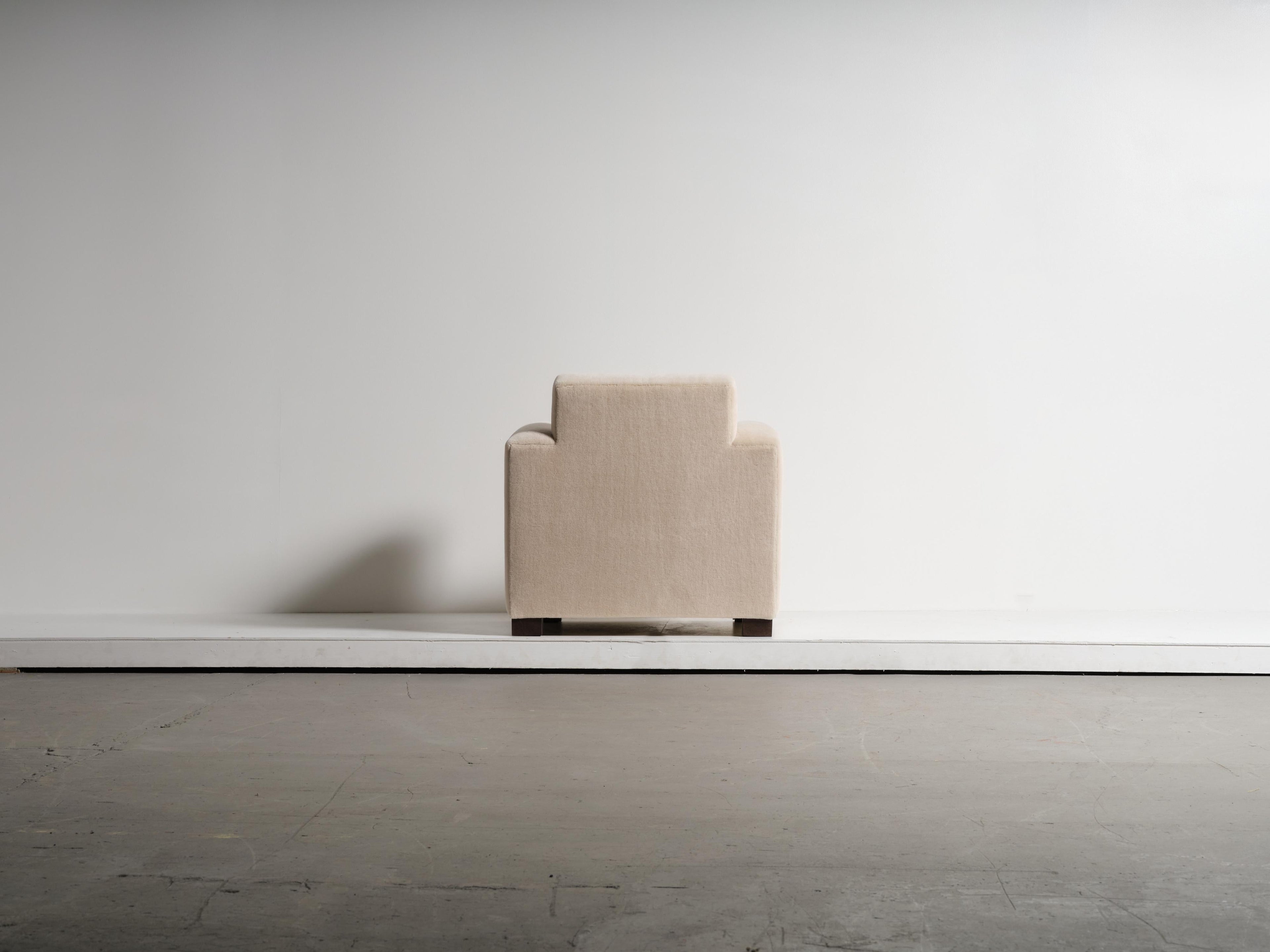 https://a.1stdibscdn.com/a-club-chair-upholstered-in-ivory-pure-alpaca-for-sale-picture-7/f_22593/f_486245621770065197287/51_Adnet_Style_Alpaca_SA03_1_26_0198_master.jpg