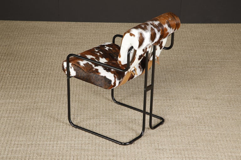 https://a.1stdibscdn.com/pair-of-cowhide-leather-tucroma-armchairs-by-guido-faleschini-for-mariani-new-for-sale-picture-12/f_13302/f_394542421714164460537/_53A4618_master.jpg?width=768