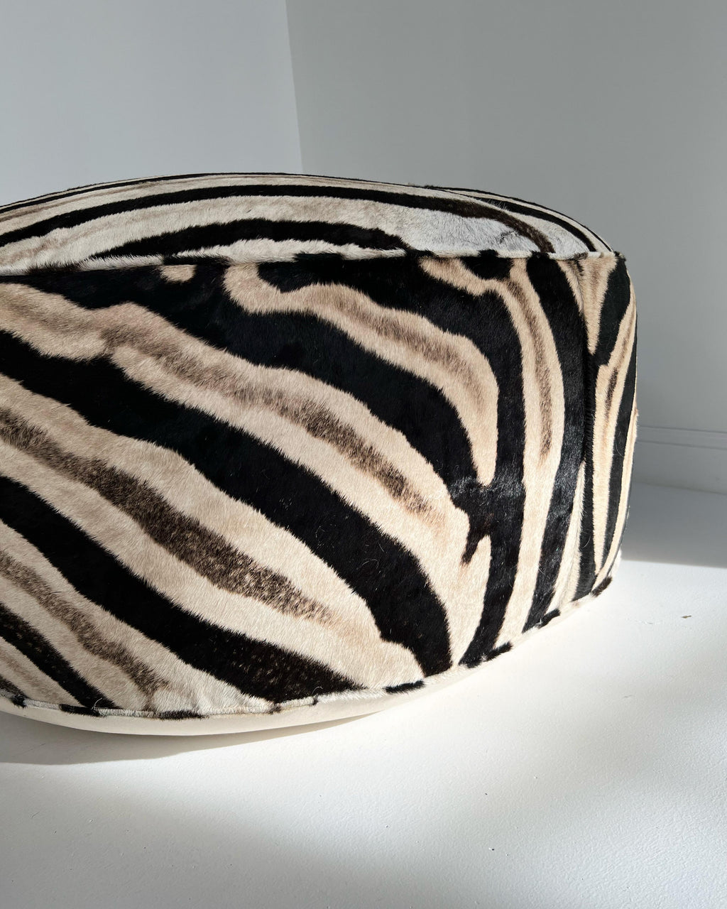 https://a.1stdibscdn.com/the-forsyth-cloud-ottoman-in-zebra-hide-for-sale-picture-11/f_17012/f_219486221659107875718/53CA6F35_BA38_4700_BE34_383E2D70687B_master.JPG
