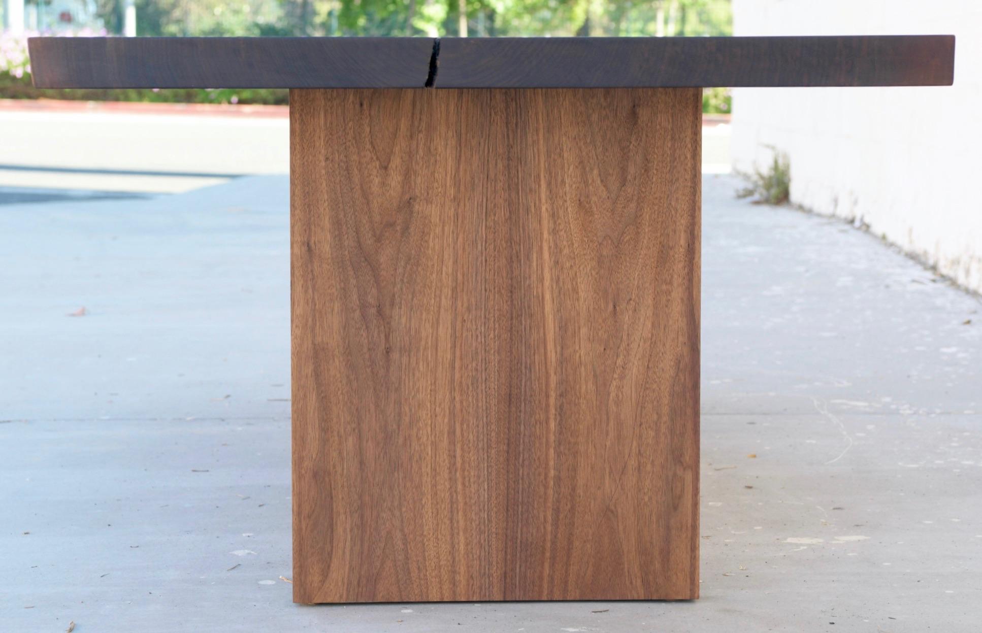 https://a.1stdibscdn.com/walnut-slab-live-edge-dining-table-custom-made-by-petersen-antiques-for-sale-picture-5/f_8065/1597847484757/55F44044_8C69_46E9_AB22_2CD4621AA6A2_master.jpeg