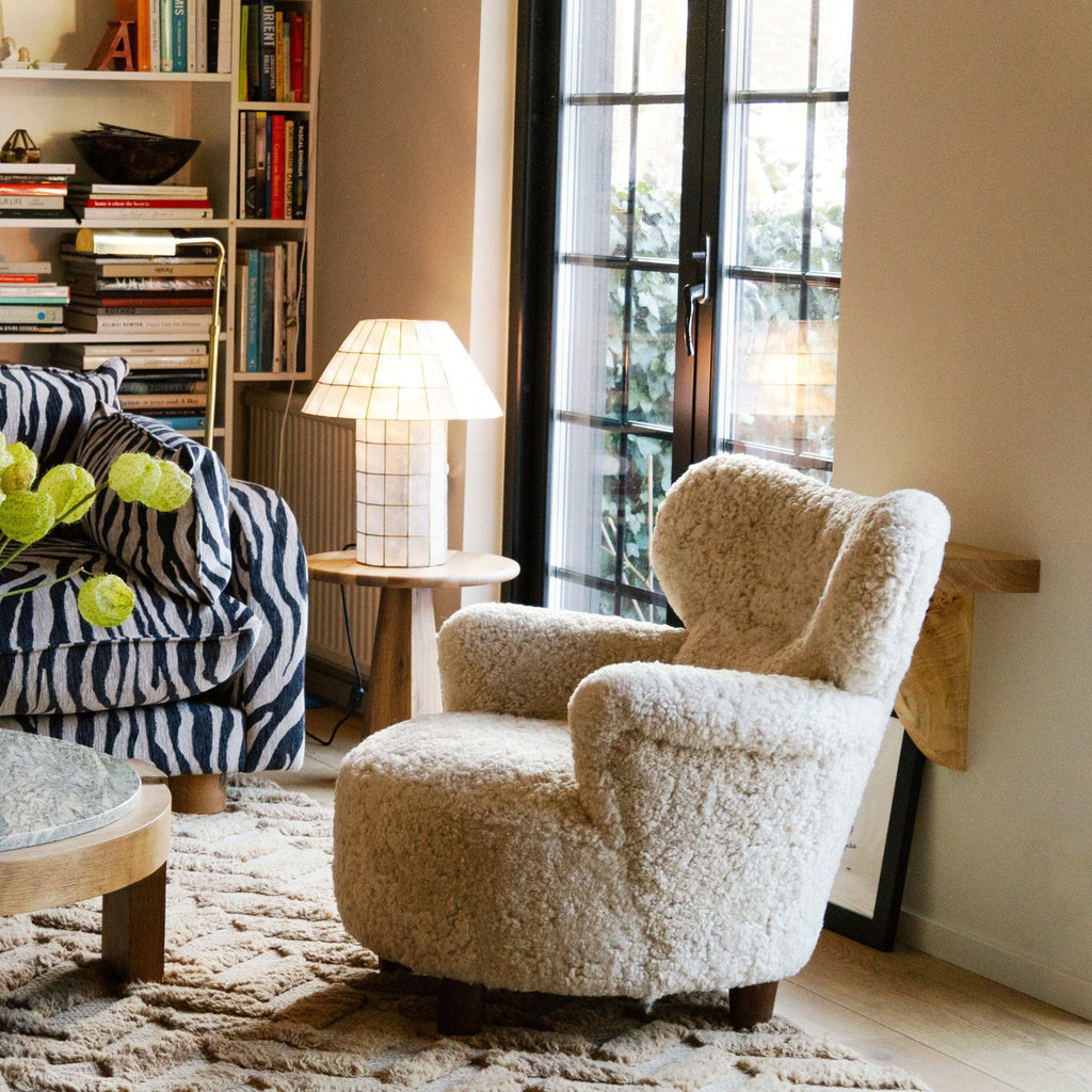 https://a.1stdibscdn.com/sheepskin-upholstered-armchair-by-elias-svedberg-model-elias-for-sale-picture-7/f_58912/f_488379521771275919971/560A3237_1_master.jpg