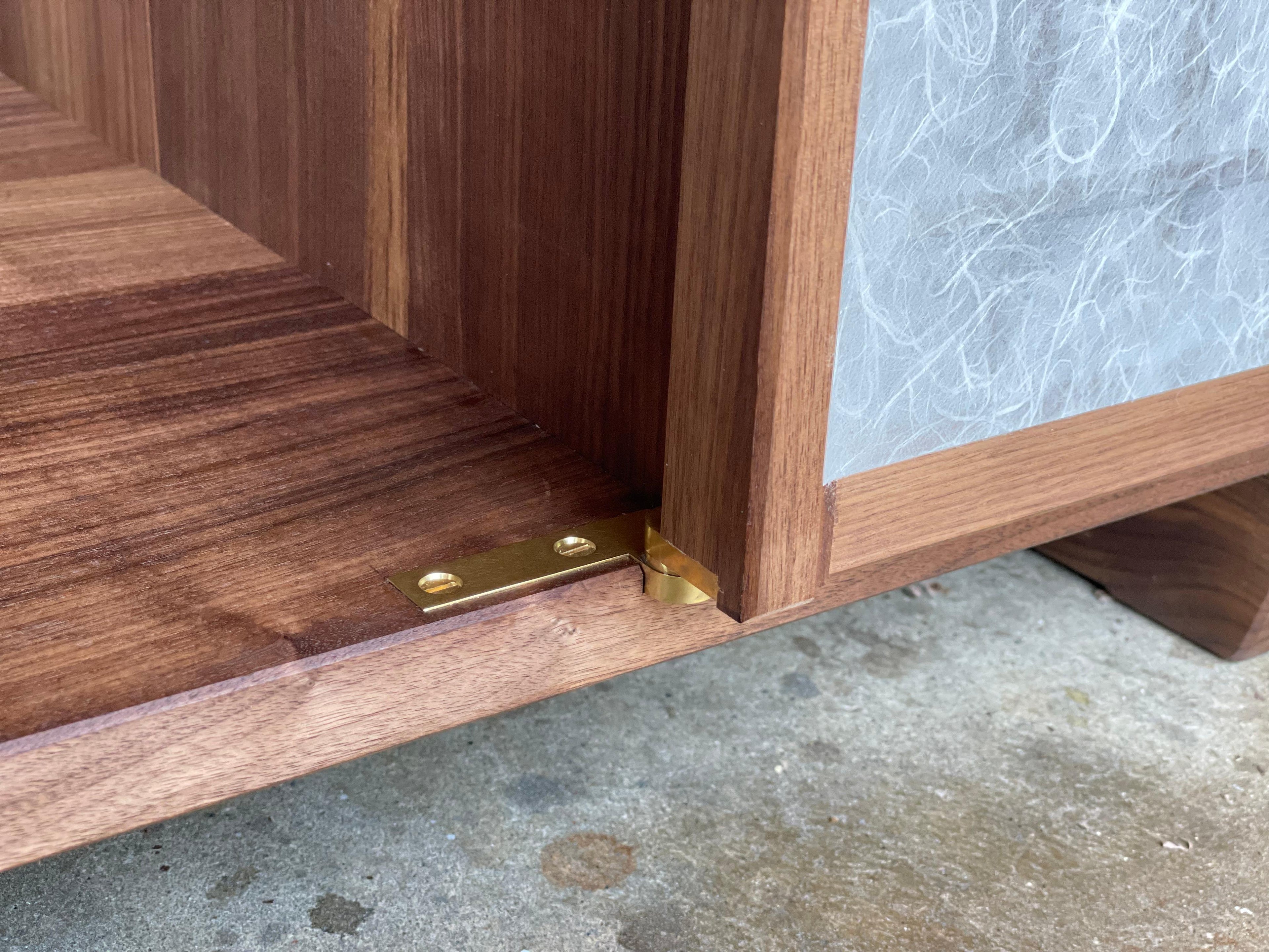 https://a.1stdibscdn.com/walnut-media-cabinet-room-divider-with-shoji-doors-for-sale-picture-6/f_45782/f_291309321655341949996/59133FB1_F516_4C12_BD58_F8CEA395A9A9_master.jpeg
