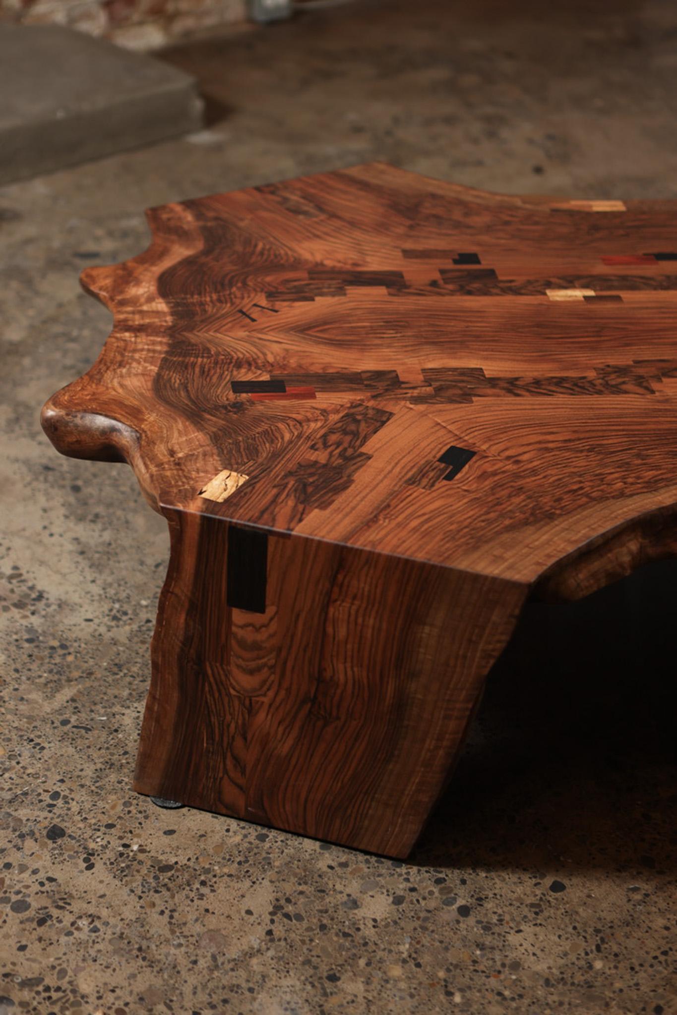 https://a.1stdibscdn.com/bastogne-walnut-live-edge-coffee-table-the-grizz-in-stock-for-sale-picture-7/f_51472/f_488225121771192763607/5AC35EE9_0670_437F_839E_901D676A25E9_1_105_c_master.jpg