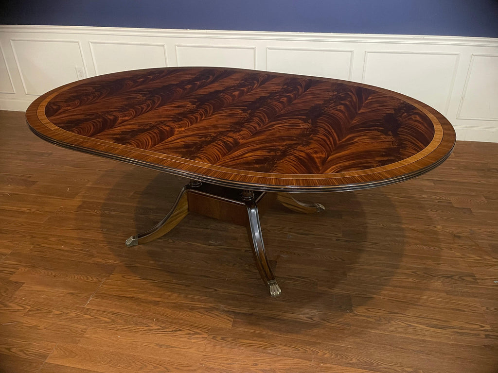 https://a.1stdibscdn.com/round-oval-mahogany-georgian-style-single-pedestal-dining-table-by-leighton-hall-for-sale-picture-4/f_44162/f_135448321680917257463/5DD0C7A6_AD77_4A67_BE24_E16AAD7B7775_master.jpeg