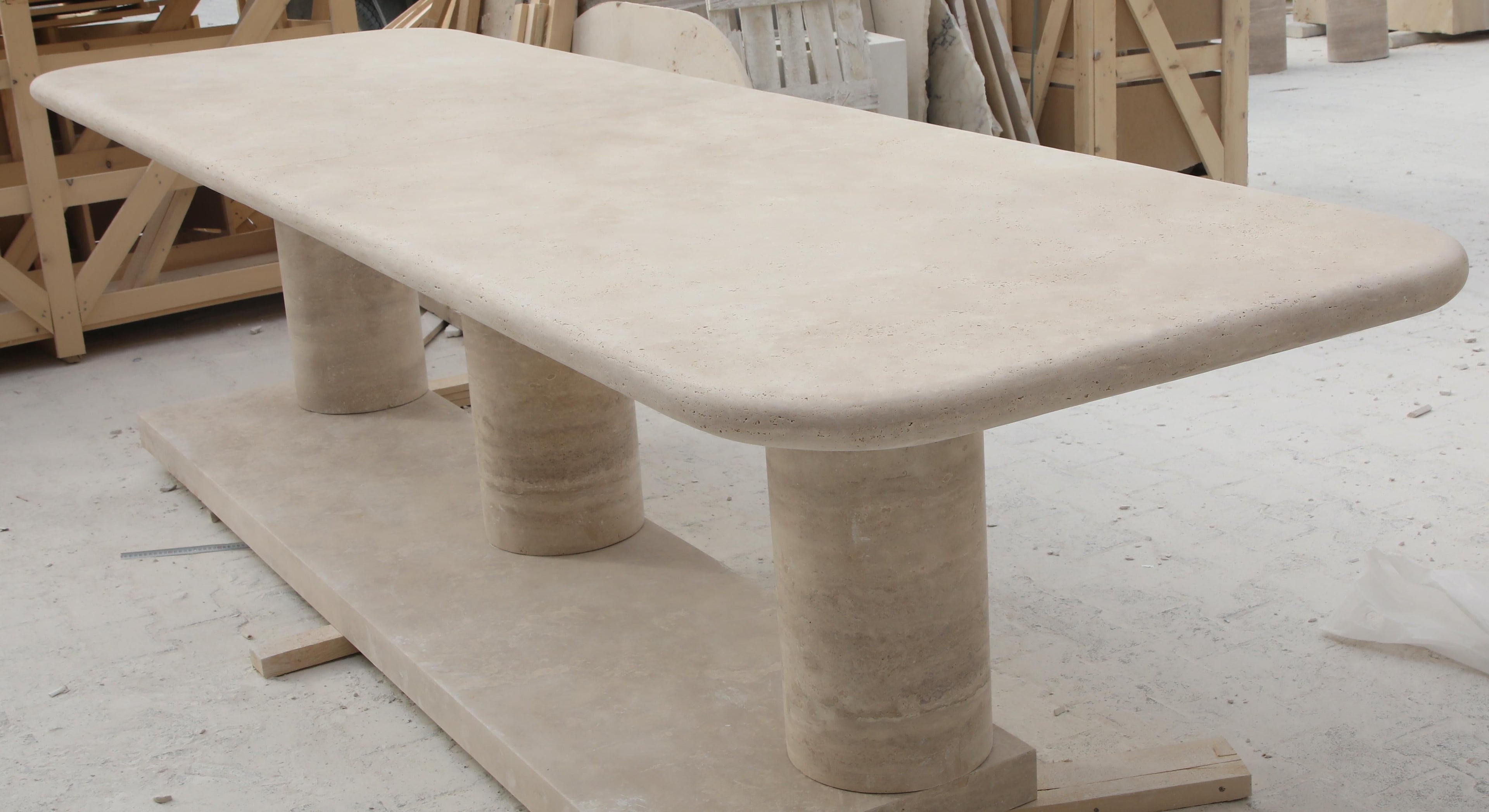 https://a.1stdibscdn.com/sculptural-large-travertine-dining-table-with-cylindrical-bases-and-curved-edges-for-sale-picture-7/f_80522/f_424148521732221397303/5DIV5979_master.JPG