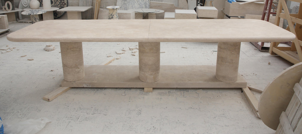 https://a.1stdibscdn.com/sculptural-large-travertine-dining-table-with-cylindrical-bases-and-curved-edges-for-sale-picture-4/f_80522/f_424148521732221221393/5DIV5983_master.JPG