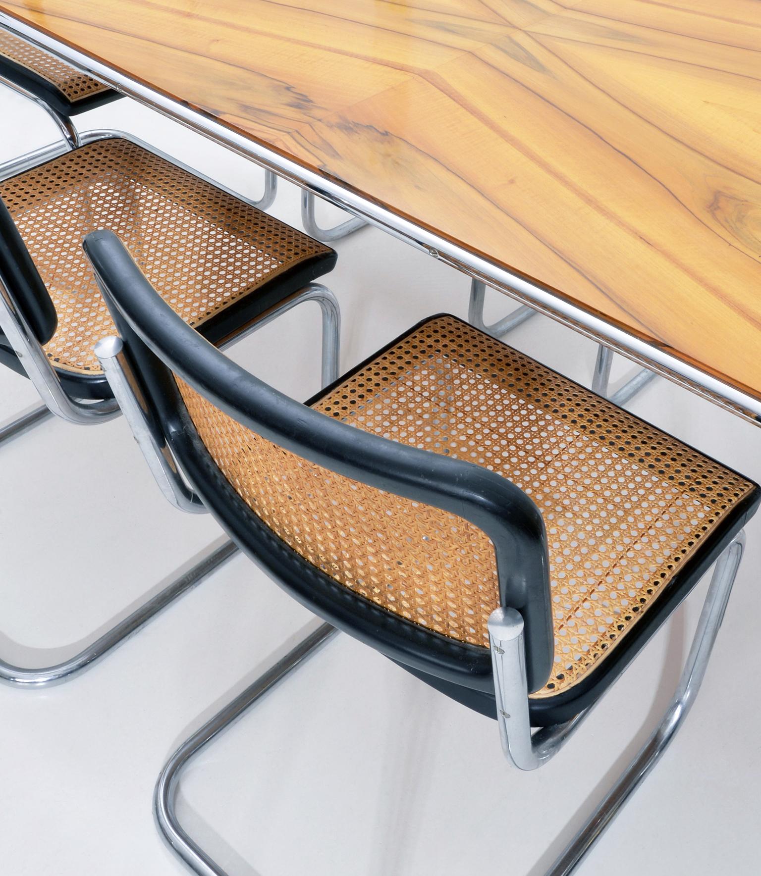 https://a.1stdibscdn.com/modernist-customizable-tubular-steel-table-by-gmd-berlin-veneered-wooden-top-for-sale-picture-6/f_19723/f_271179221643383361034/5_MODERN_XX_GMD_Berlin_Stahlrohr_Schlaufentisch_Tubular_steel_table_master.jpg