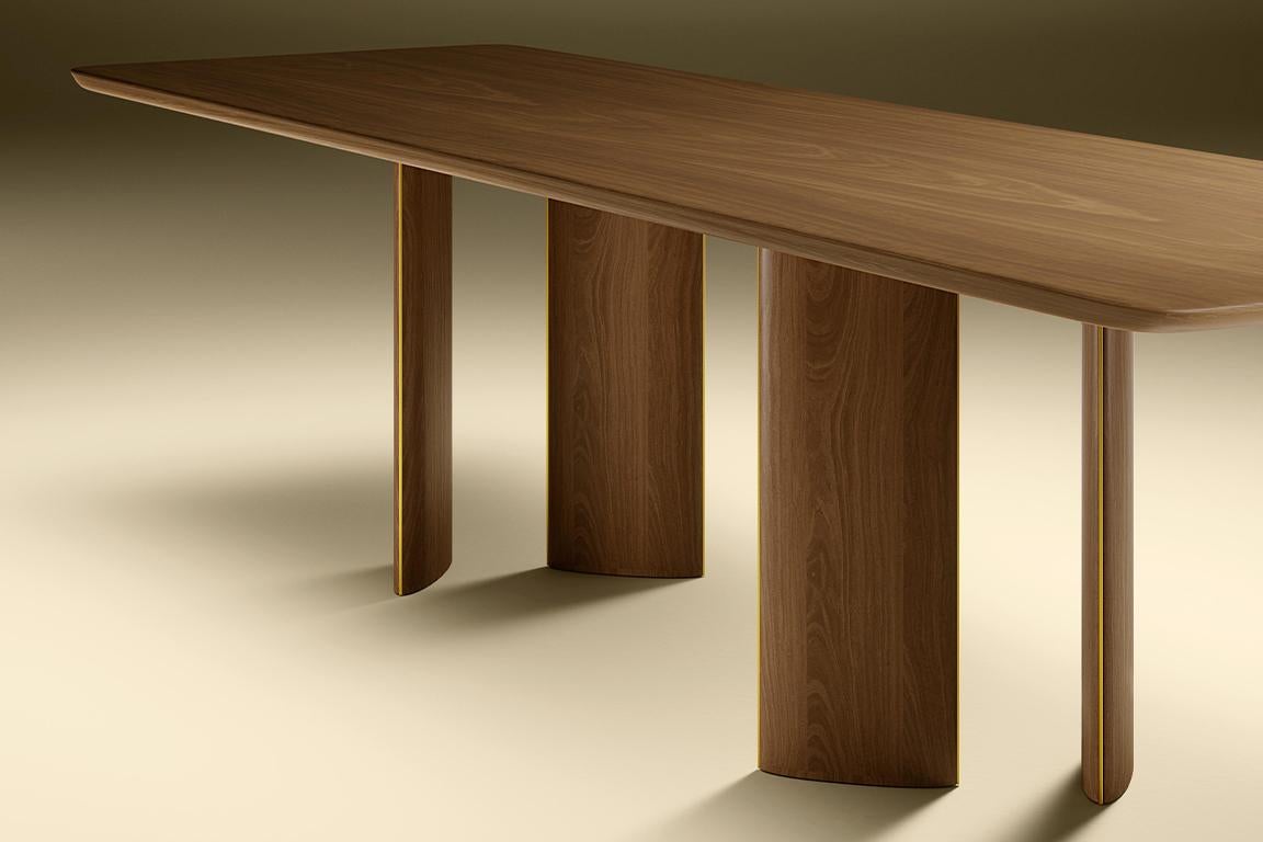 https://a.1stdibscdn.com/walnut-wood-dining-table-with-metal-trims-by-tatjana-von-stein-france-for-sale-picture-3/f_89372/f_357044221692178932679/5_master.jpg