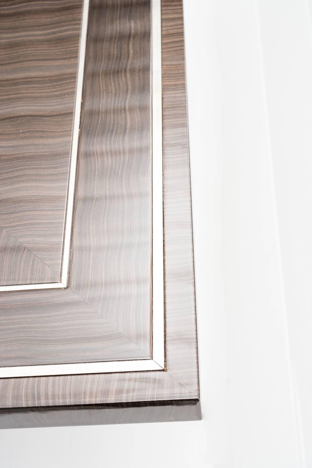 https://a.1stdibscdn.com/art-deco-style-important-dining-room-table-veneer-wood-top-and-chrome-inserts-for-sale-picture-7/f_9859/f_207354321601055004280/5_master.jpg
