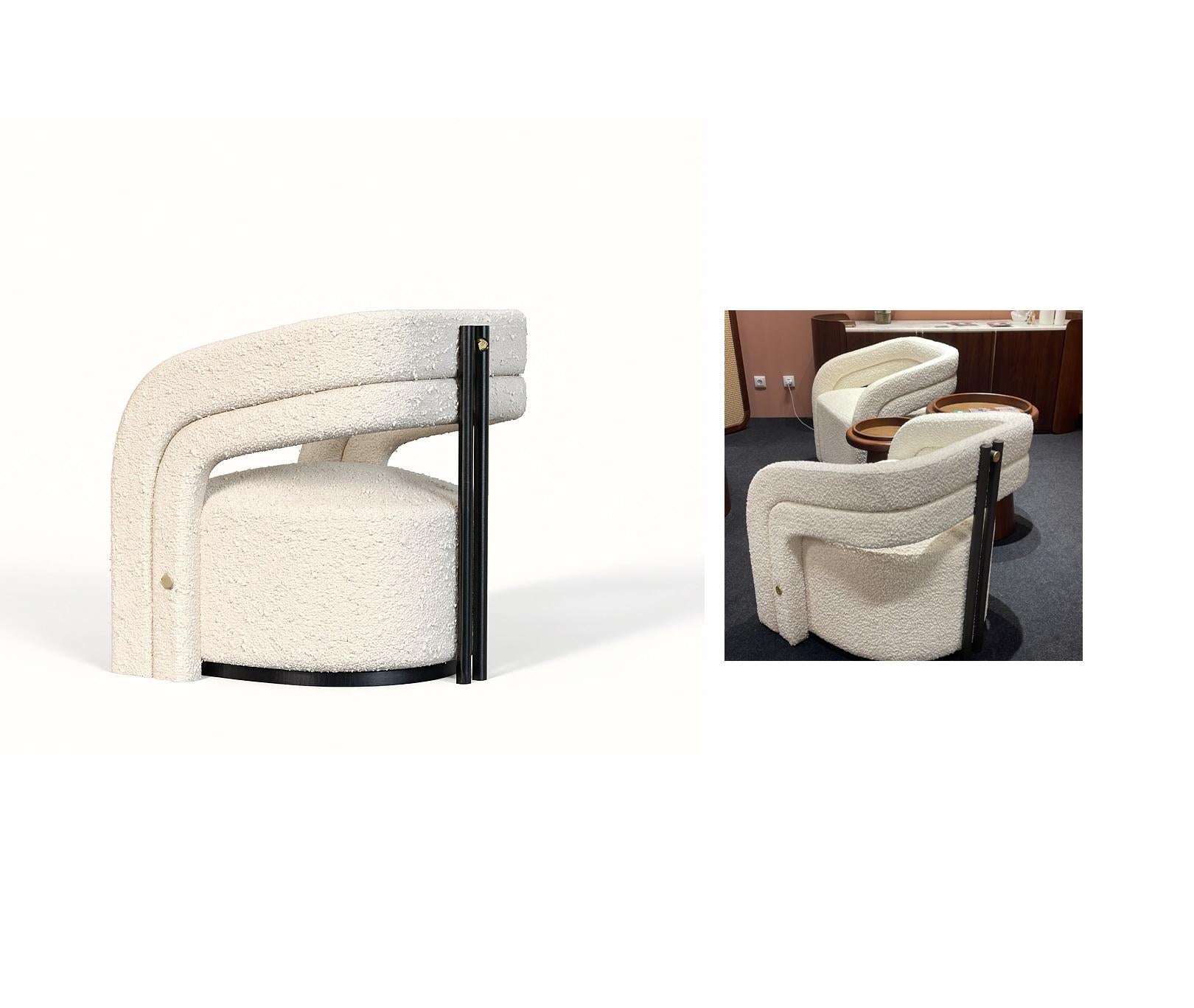 https://a.1stdibscdn.com/modern-boucle-upholstered-armchair-with-black-lacquered-metal-base-for-sale-picture-5/f_27693/f_466032621757489485199/5_master.jpg