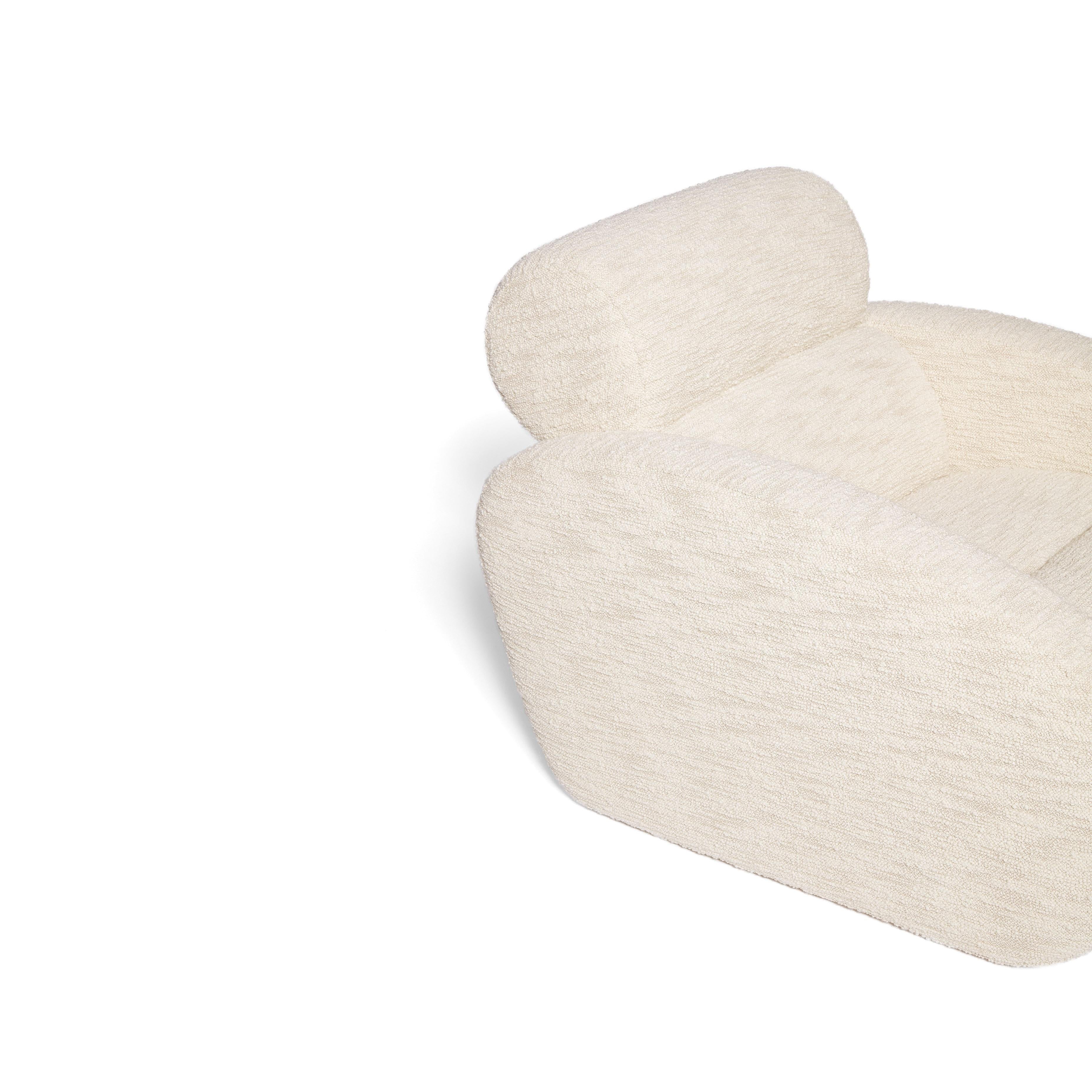 https://a.1stdibscdn.com/relaxing-boucle-armchair-with-curvy-silhouette-for-sale-picture-5/f_27693/f_330470421677674866034/5_master.jpg