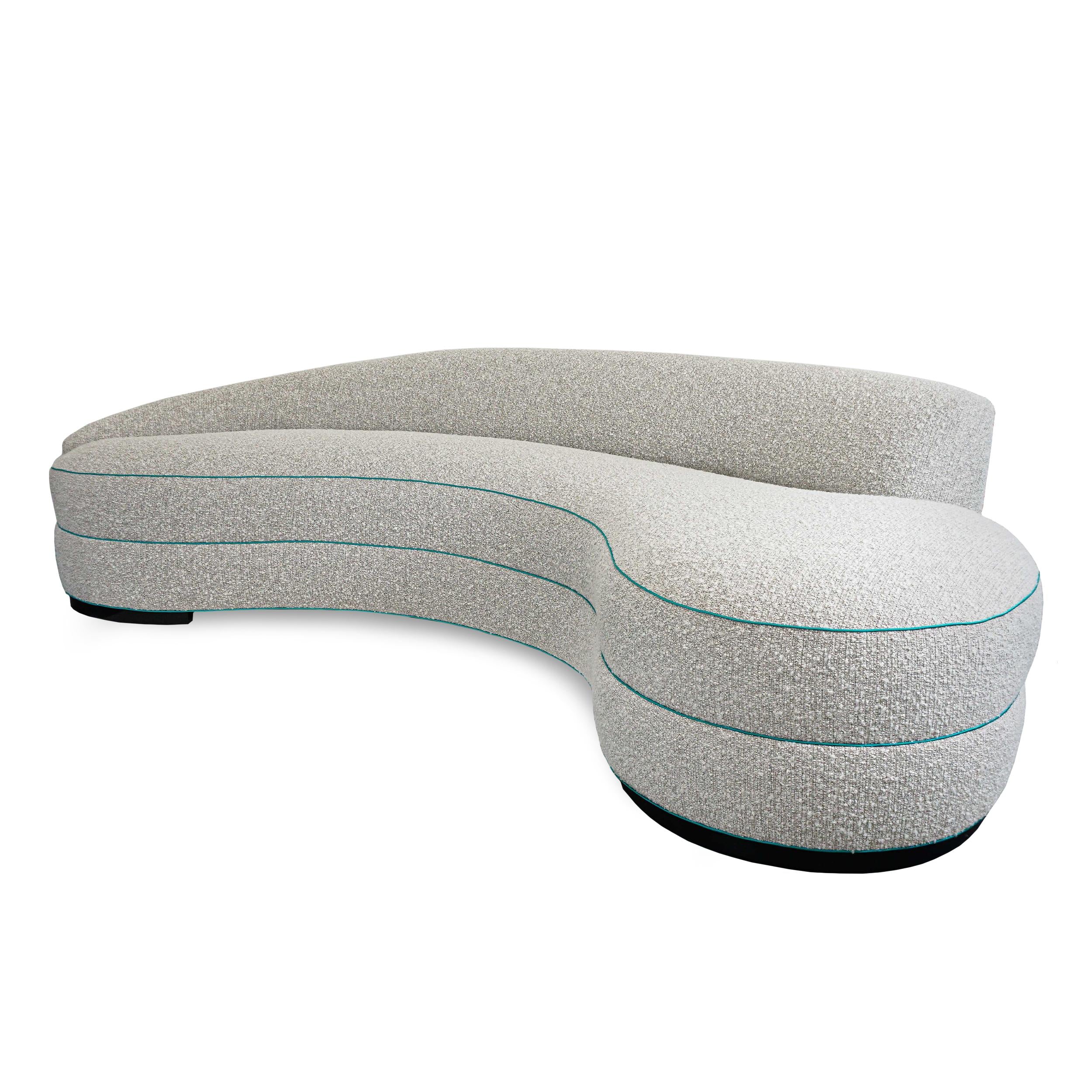 https://a.1stdibscdn.com/boucle-curved-sofa-with-turquoise-accents-for-sale-picture-4/f_21233/1622750899324/5_master.jpg