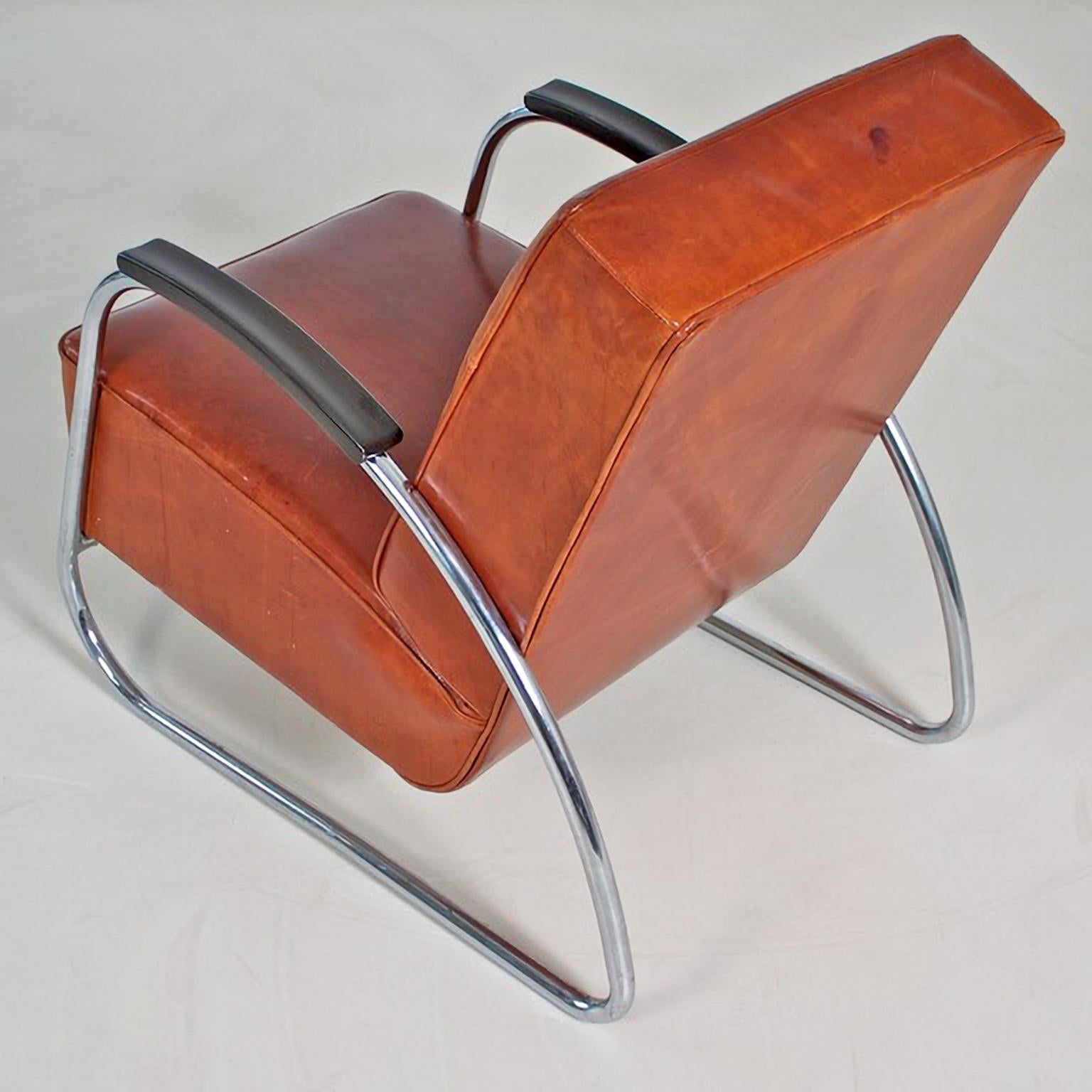 https://a.1stdibscdn.com/customizable-modernist-club-chair-by-mauser-chromed-metal-leather-upholstery-for-sale-picture-5/f_19723/f_335037921679924117841/5_master.jpg