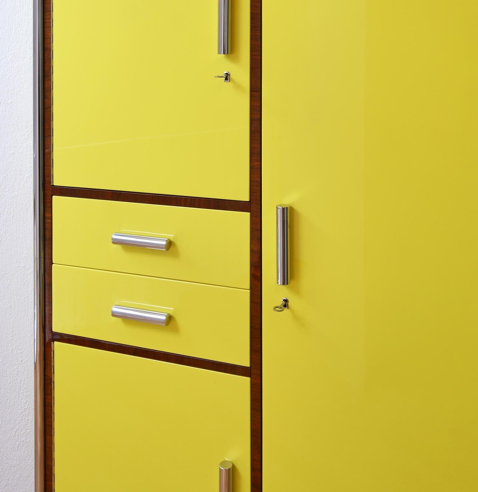 https://a.1stdibscdn.com/modernist-tubular-steel-cabinet-lacquered-and-veneered-wood-customizable-for-sale-picture-3/f_19723/f_406290321721140013470/5_master.jpg