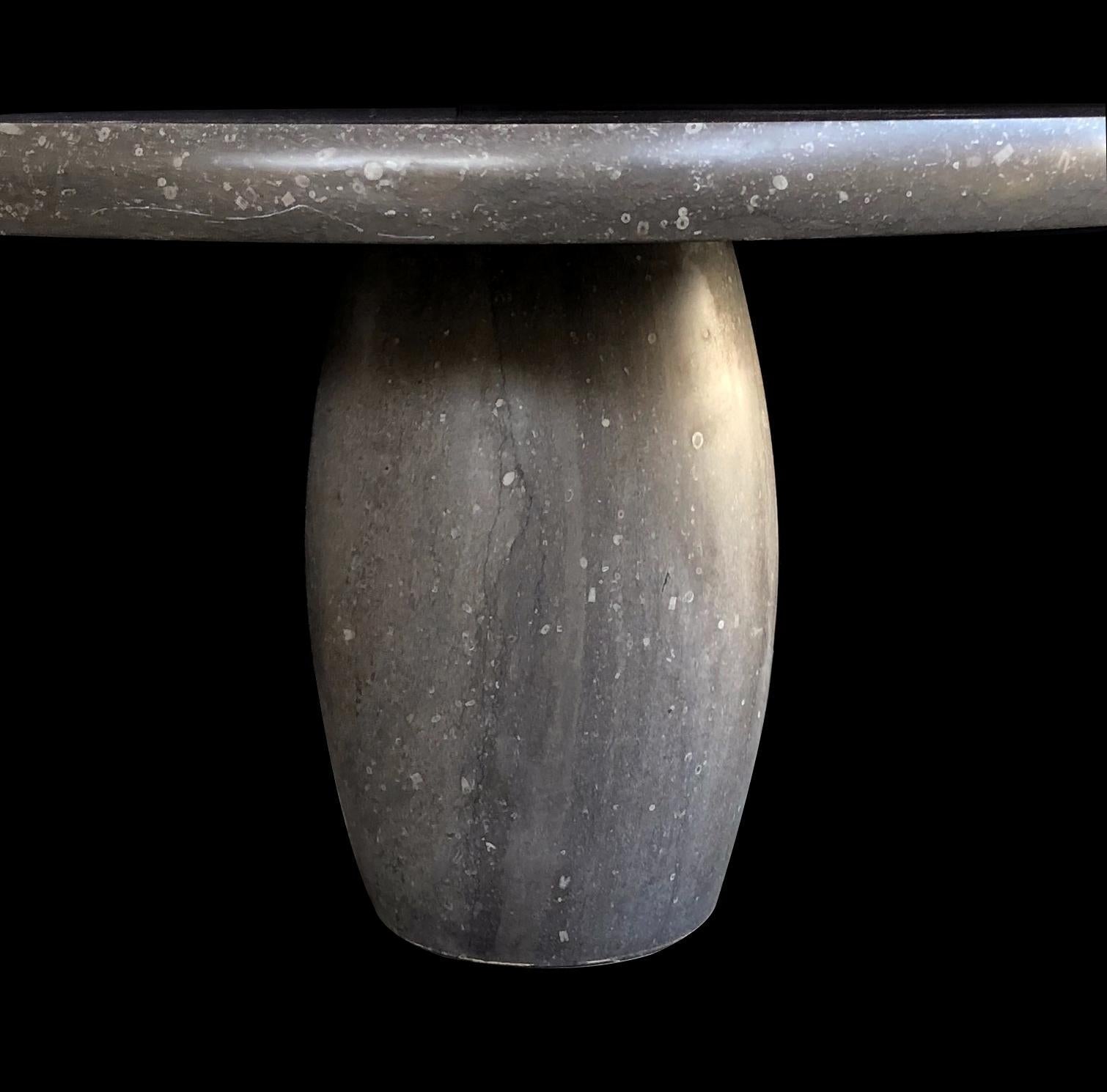 https://a.1stdibscdn.com/a-carved-belgian-bluestone-round-dining-center-table-with-barrel-form-base-for-sale-picture-2/f_7970/f_382744021707172489997/60501d1_master.jpeg