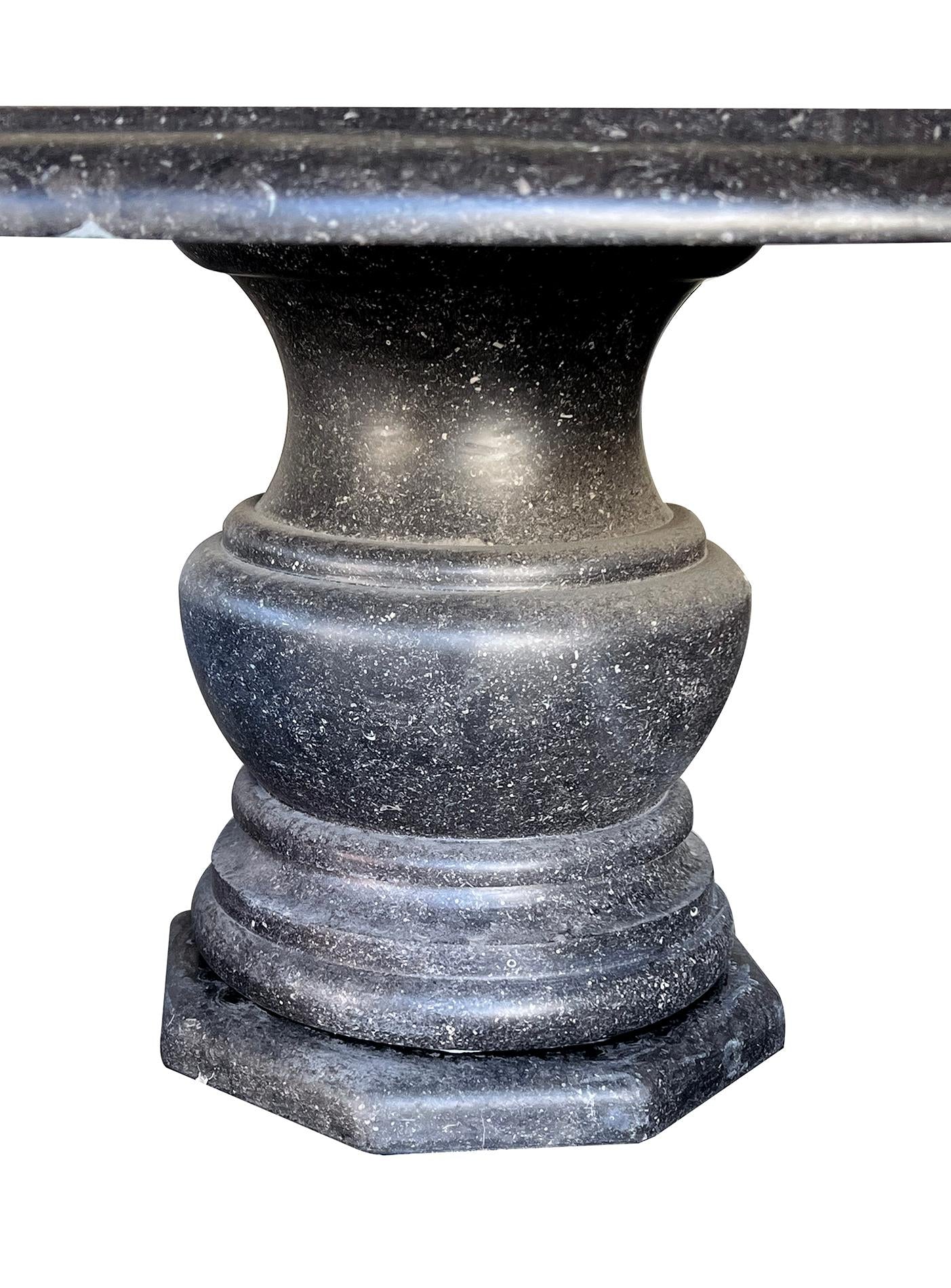 https://a.1stdibscdn.com/custom-belgian-bluestone-round-dining-center-table-with-baluster-base-for-sale-picture-4/f_7970/f_489474421771875569959/60572d3_master.jpg