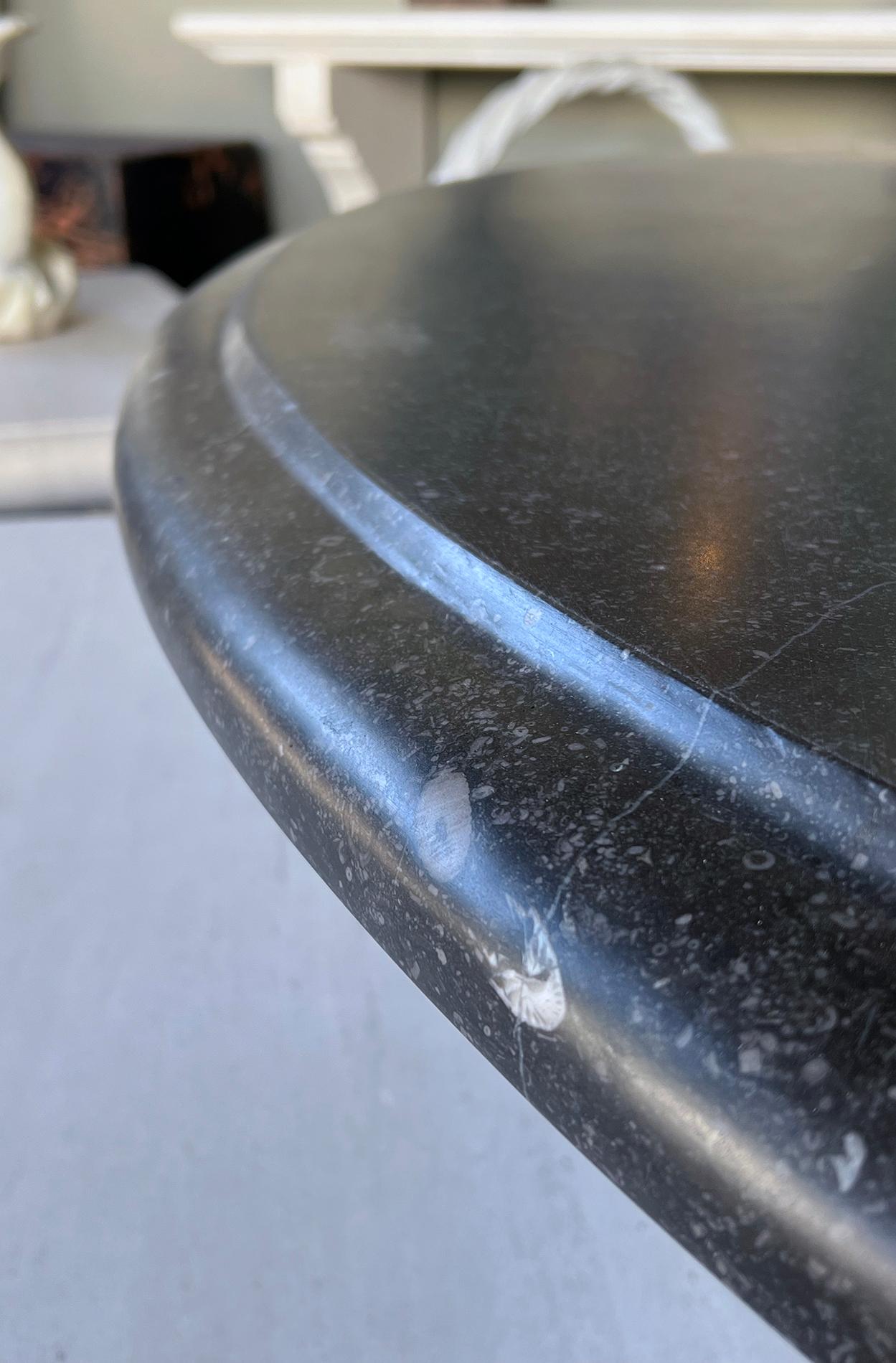 https://a.1stdibscdn.com/custom-belgian-bluestone-round-dining-center-table-with-baluster-base-for-sale-picture-6/f_7970/f_489474421771875570946/60572d5_master.jpg