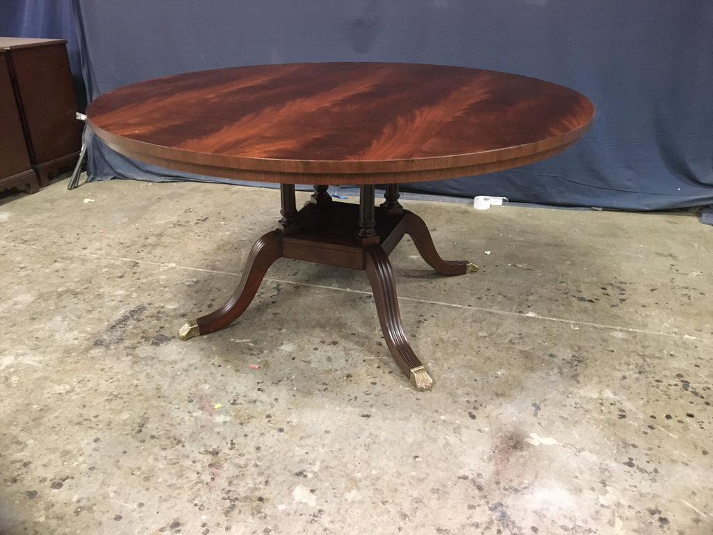https://a.1stdibscdn.com/60-in-round-mahogany-georgian-style-pedestal-dining-table-by-leighton-hall-for-sale-picture-9/f_44162/f_227264821614449514096/65D9F3A4_8AD7_416E_B44E_5D6ED687CA53_master.jpeg