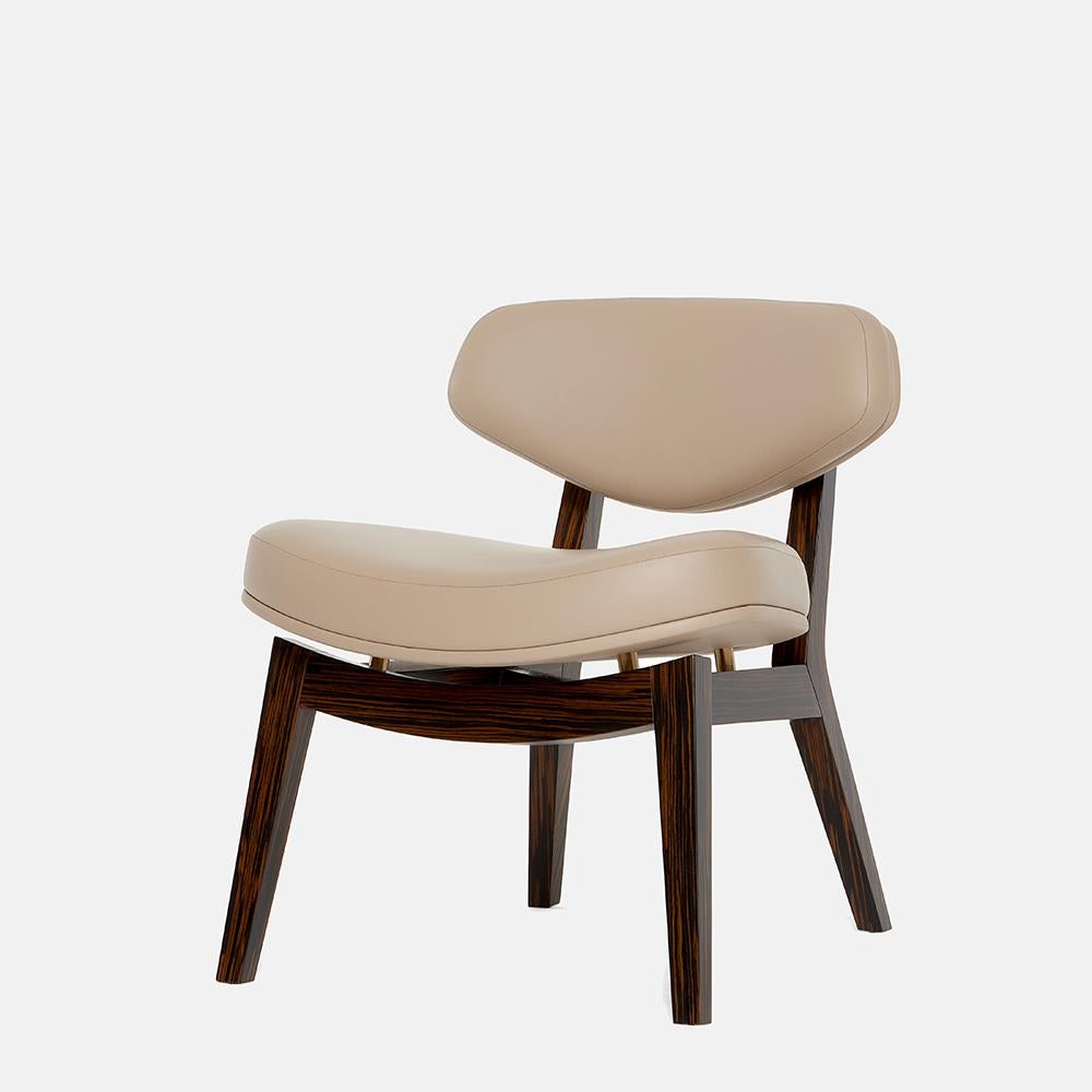 https://a.1stdibscdn.com/mid-century-modern-style-armchair-in-ebony-veneer-and-brass-accents-for-sale-picture-10/f_27693/f_488983821771568582803/6633c46682641747c4b2dd55_Carlyle_Collective_Coleman_Armchair_5__master.jpeg