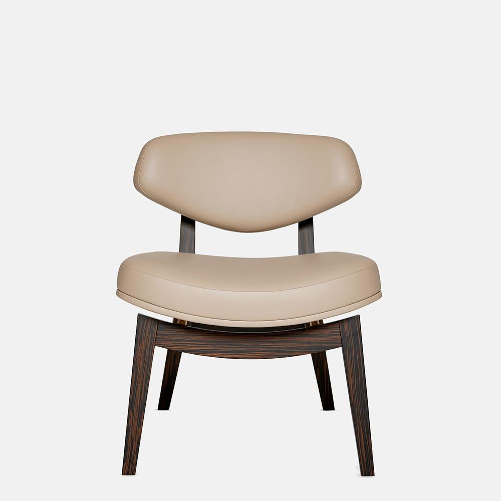 https://a.1stdibscdn.com/mid-century-modern-style-armchair-in-ebony-veneer-and-brass-accents-for-sale-picture-11/f_27693/f_488983821771568583286/6633c46682641747c4b2dd58_Carlyle_Collective_Coleman_Armchair_0__master.jpeg