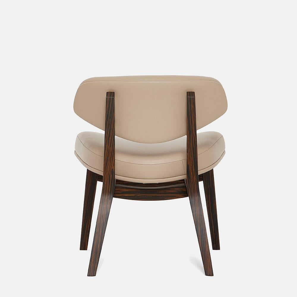https://a.1stdibscdn.com/mid-century-modern-style-armchair-in-velvet-with-ebony-veneer-and-brass-accents-for-sale-picture-4/f_27693/f_488398021771283850235/6633c46682641747c4b2dd5e_Carlyle_Collective_Coleman_Armchair_2__master.jpeg
