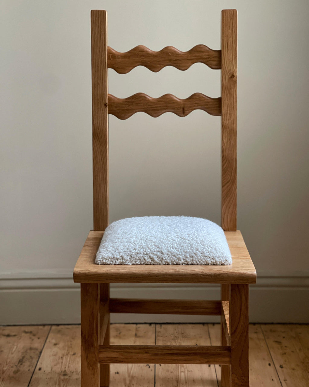 https://a.1stdibscdn.com/sunday-chair-oak-and-boucle-for-sale-picture-2/f_85912/f_339068921682013474355/67BF1ADD_DFDB_4A5F_A15F_C503610F0DFC_master.jpeg