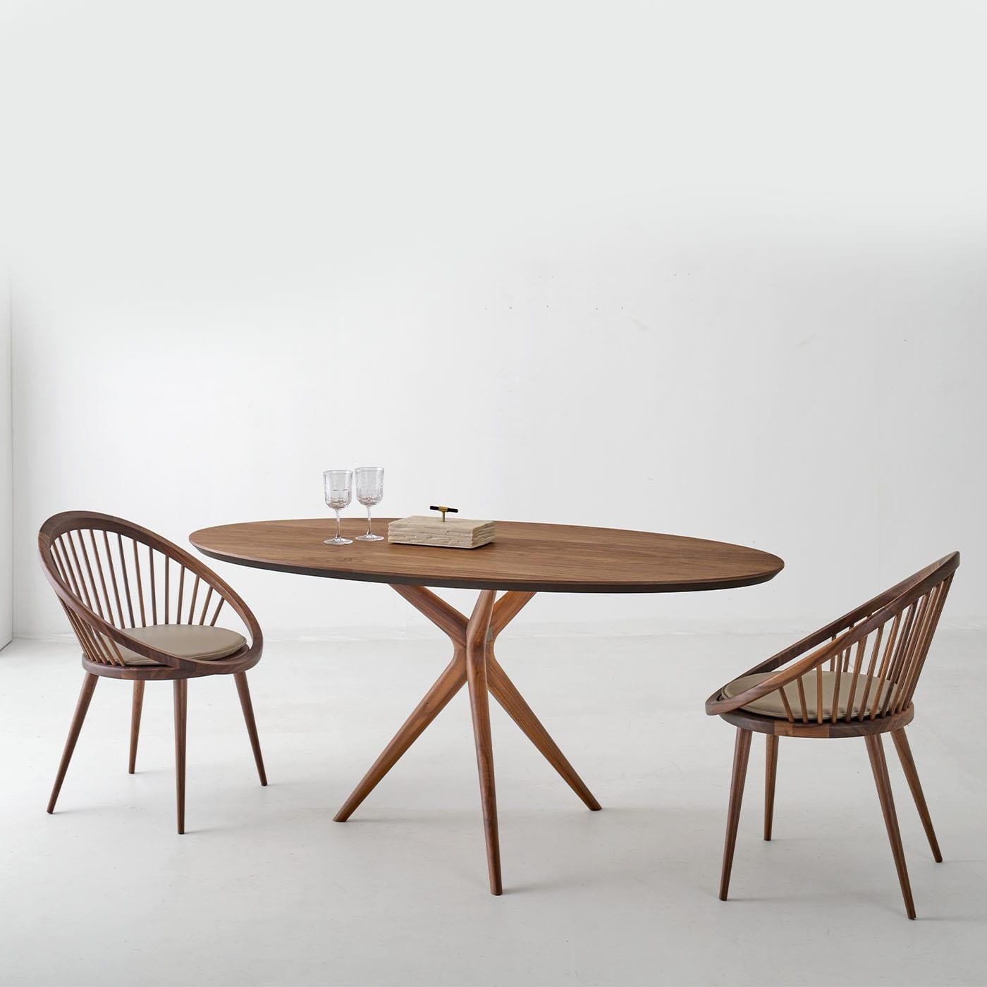https://a.1stdibscdn.com/foster-elliptical-dining-table-in-walnut-canaletto-wood-for-sale-picture-5/f_17062/f_492912621773926997040/69254mxe9e60by34k1rppinptktd_1__master.jpg