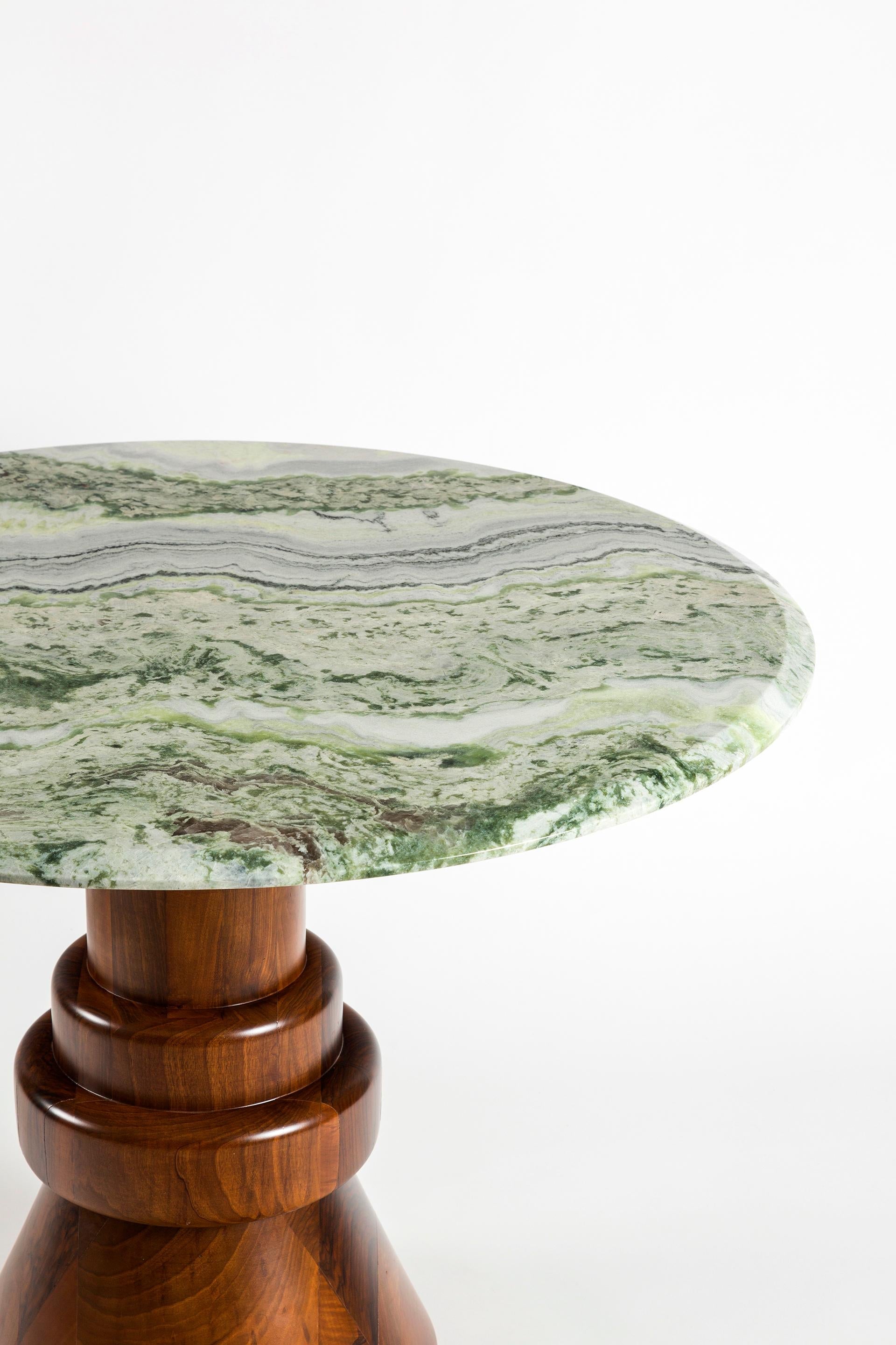 https://a.1stdibscdn.com/21st-century-pink-marble-round-dining-table-with-sculptural-green-wooden-base-for-sale-picture-5/f_36601/f_216814521607120626229/6Q8A7558_master.jpg