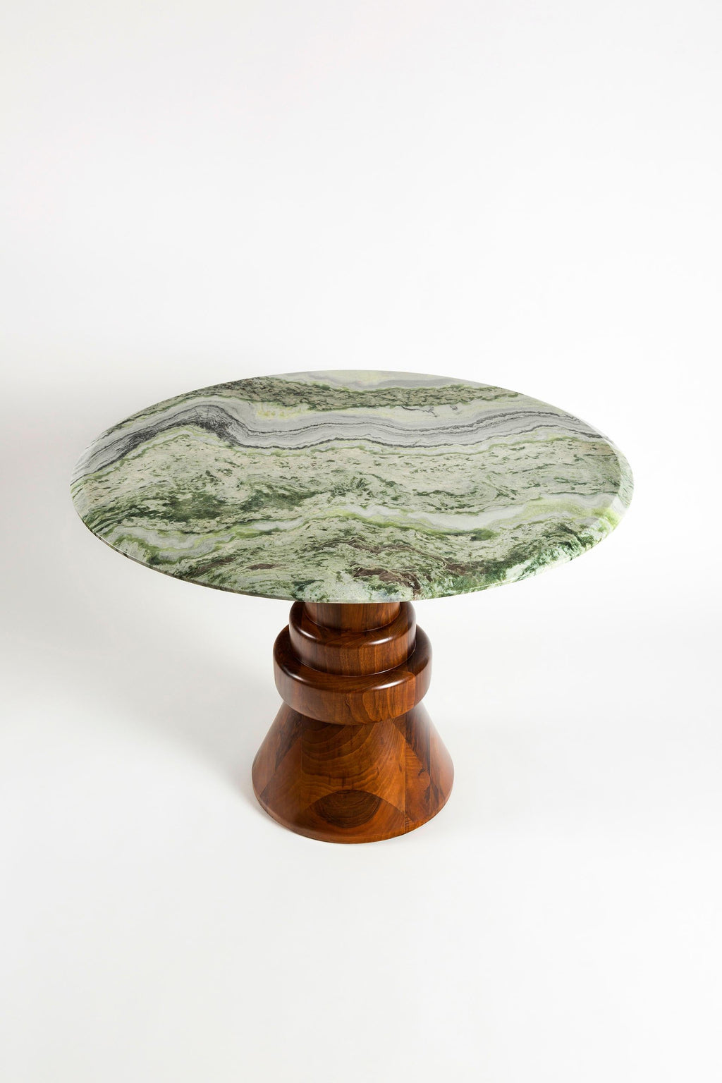 https://a.1stdibscdn.com/21st-century-green-marble-round-dining-table-with-sculptural-wooden-base-for-sale-picture-2/f_36601/f_112968131530816127426/6Q8A7582_master.jpg