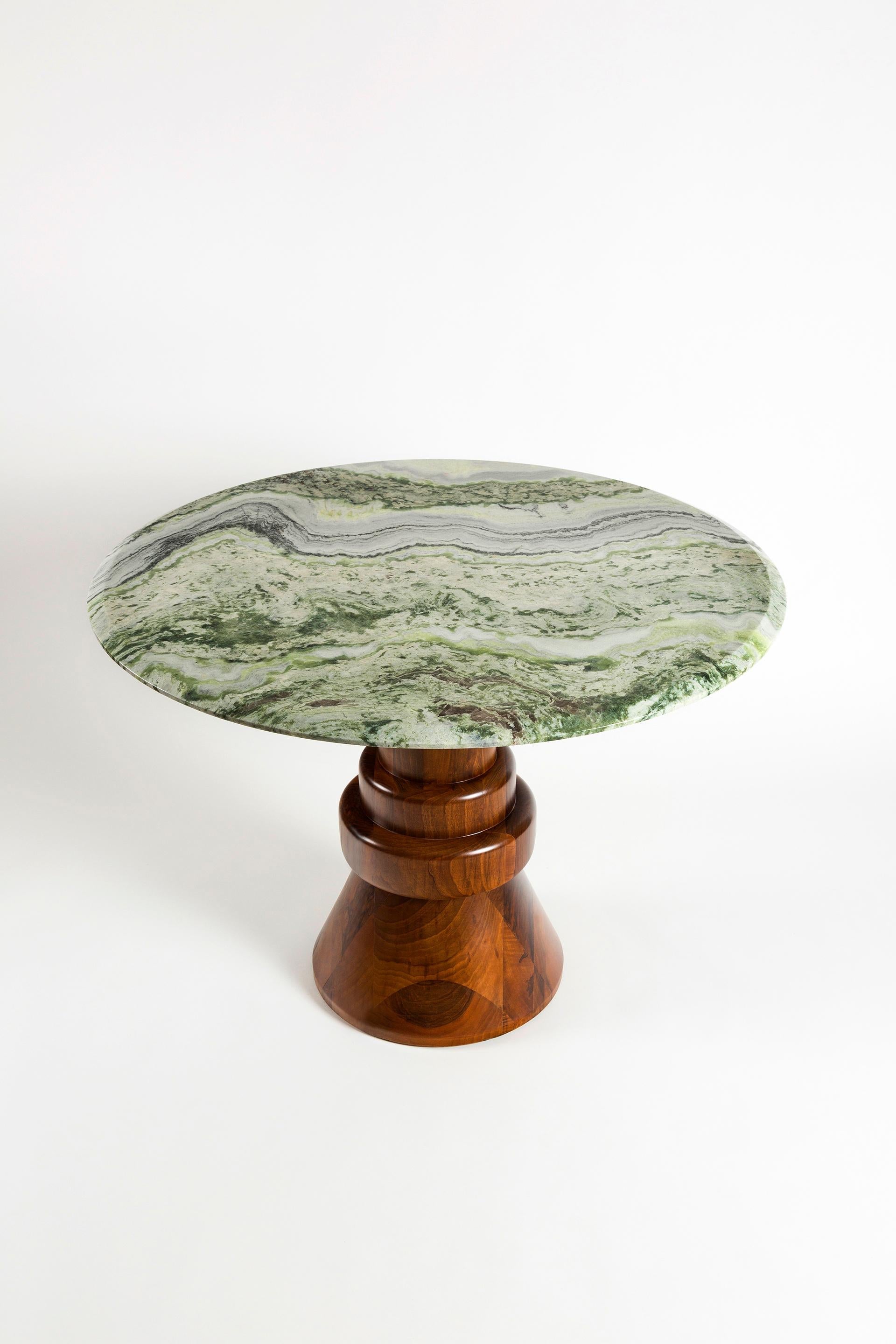 https://a.1stdibscdn.com/21st-century-green-marble-round-dining-table-with-sculptural-wooden-base-for-sale-picture-2/f_36601/f_112968131530816127426/6Q8A7582_master.jpg