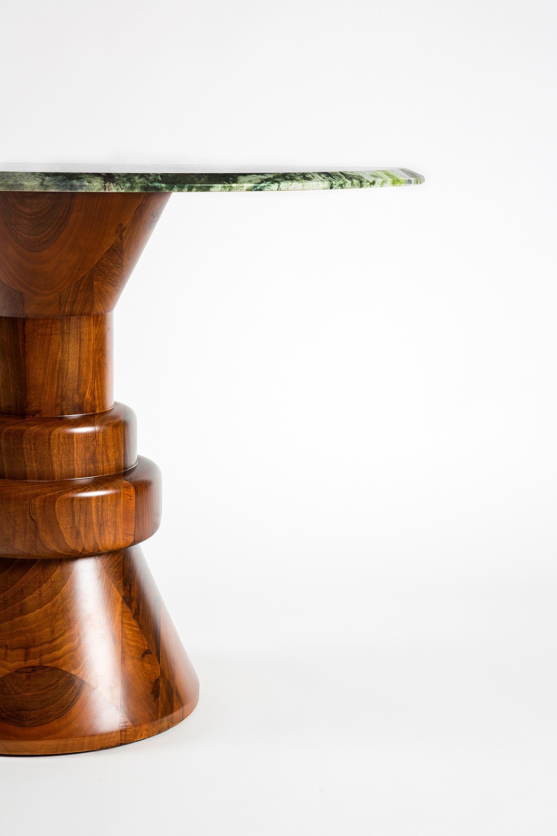 https://a.1stdibscdn.com/21st-century-cream-marble-round-dining-table-with-sculptural-wooden-base-for-sale-picture-8/f_36601/f_216814221607120539991/6Q8A7585_master.jpg