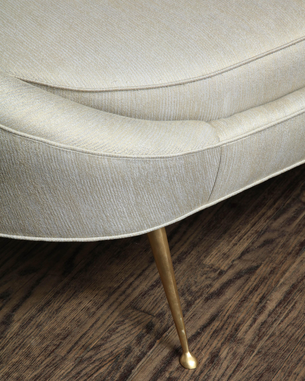 https://a.1stdibscdn.com/elegant-curved-sofa-in-custom-upholstery-with-brass-legs-for-sale-picture-5/0/f_118762311535473025979/6R1A3694_master.jpg