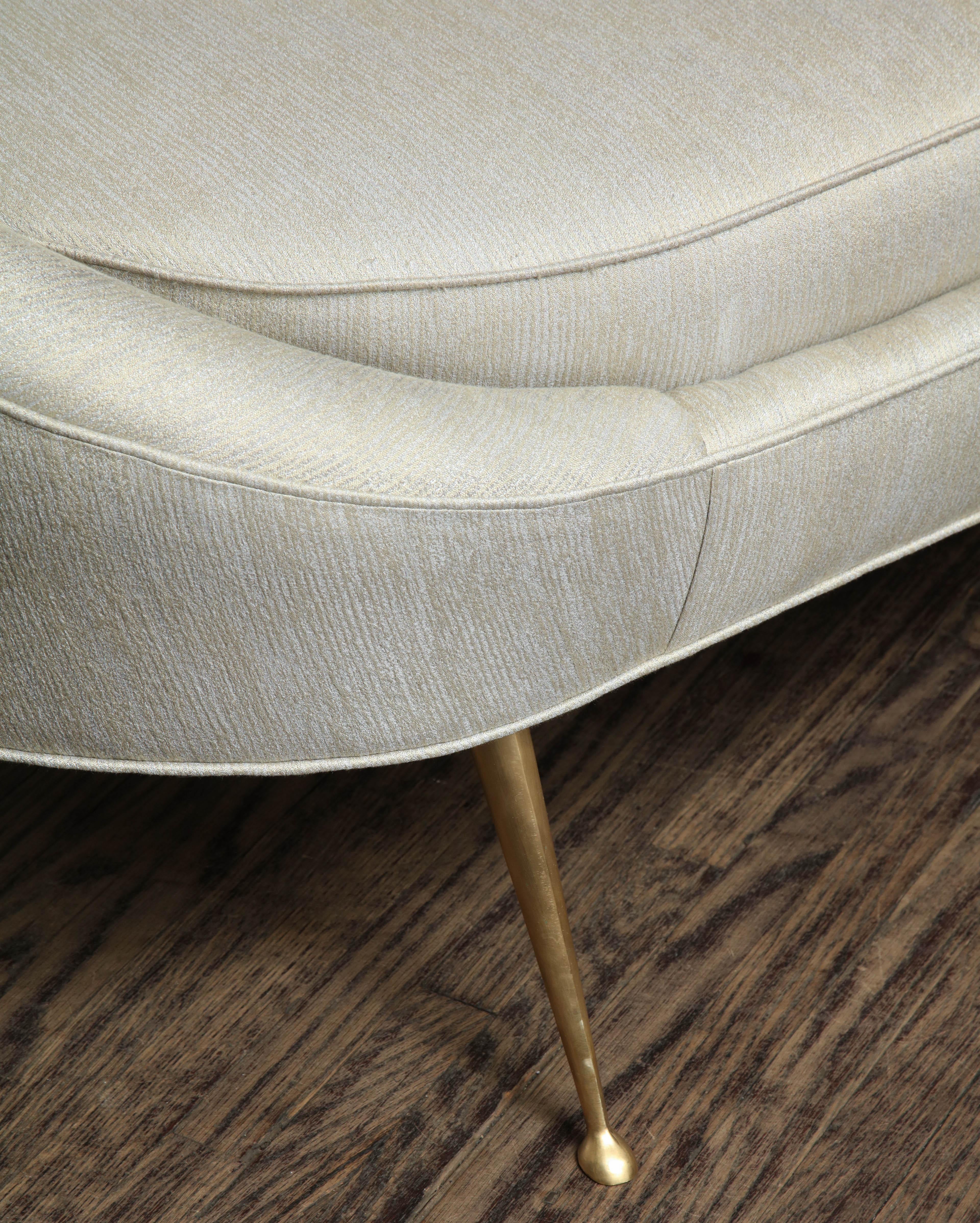 https://a.1stdibscdn.com/elegant-curved-sofa-in-custom-upholstery-with-brass-legs-for-sale-picture-5/0/f_118762311535473025979/6R1A3694_master.jpg
