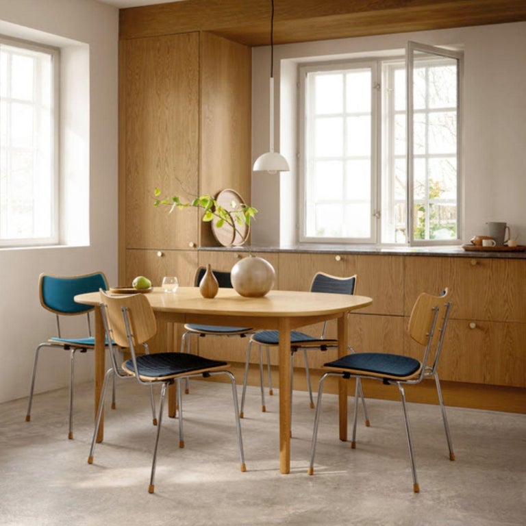 https://a.1stdibscdn.com/vilhelm-lauritzen-vla26-vega-chair-in-oak-chrome-and-oil-for-carl-hansen-son-for-sale-picture-5/f_14472/f_382103421706808085354/6Vilhelm_Lauritzen_VL26_Vega_chair_for_Carl_Hansen_and_Son_Two_Enlighten_Los_Angeles_master.jpg?width=768