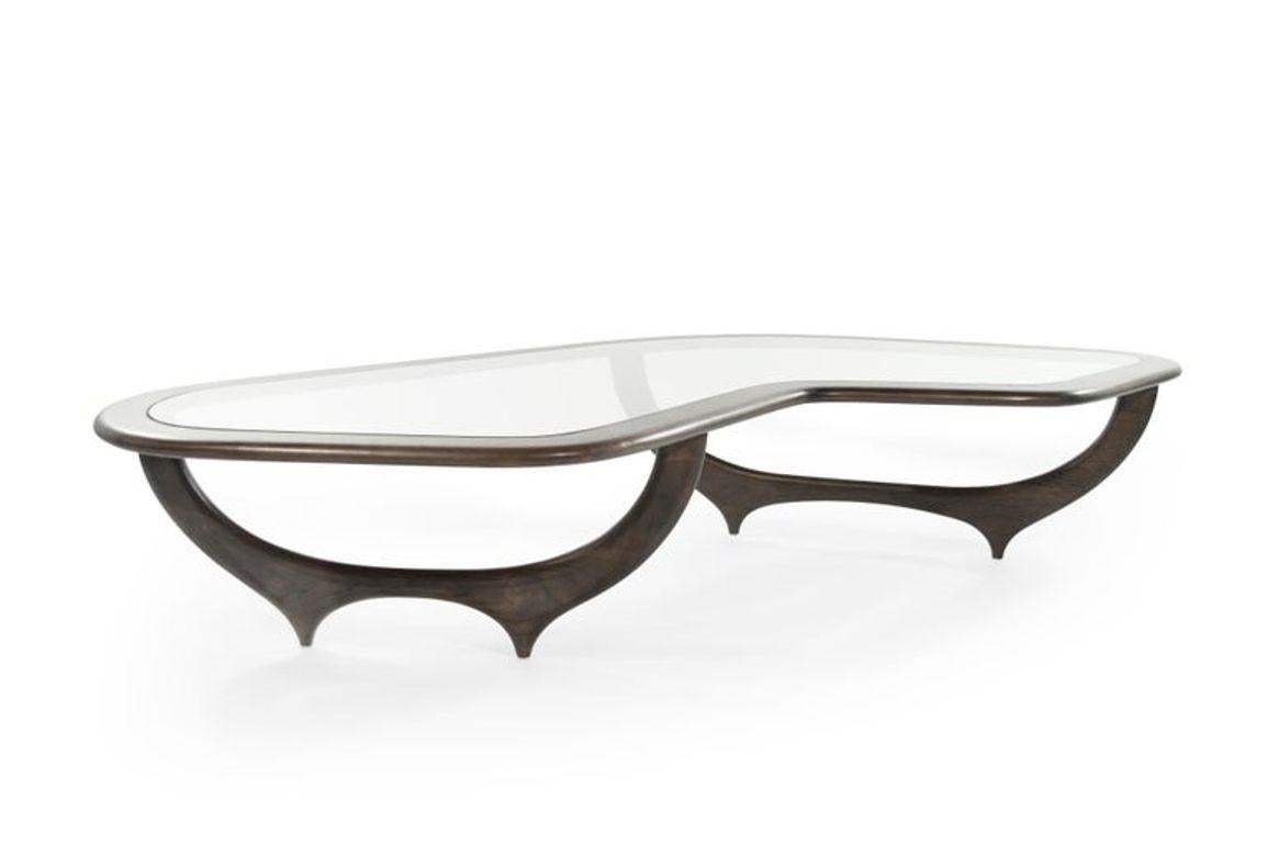 https://a.1stdibscdn.com/the-contour-coffee-table-in-walnut-by-stamford-modern-for-sale-picture-7/f_9289/f_345223121685456136151/6_ICO_PARISI_S_CTABLE_3_master_master.jpeg