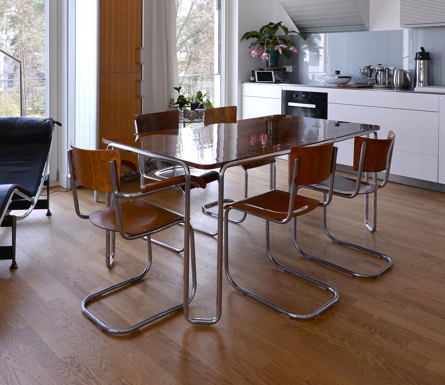https://a.1stdibscdn.com/modernist-customizable-tubular-steel-table-by-gmd-berlin-veneered-wooden-top-for-sale-picture-7/f_19723/f_271179221643383369764/6_MODERN_XX_GMD_Berlin_Stahlrohr_Schlaufentisch_Tubular_steel_table_master.jpg