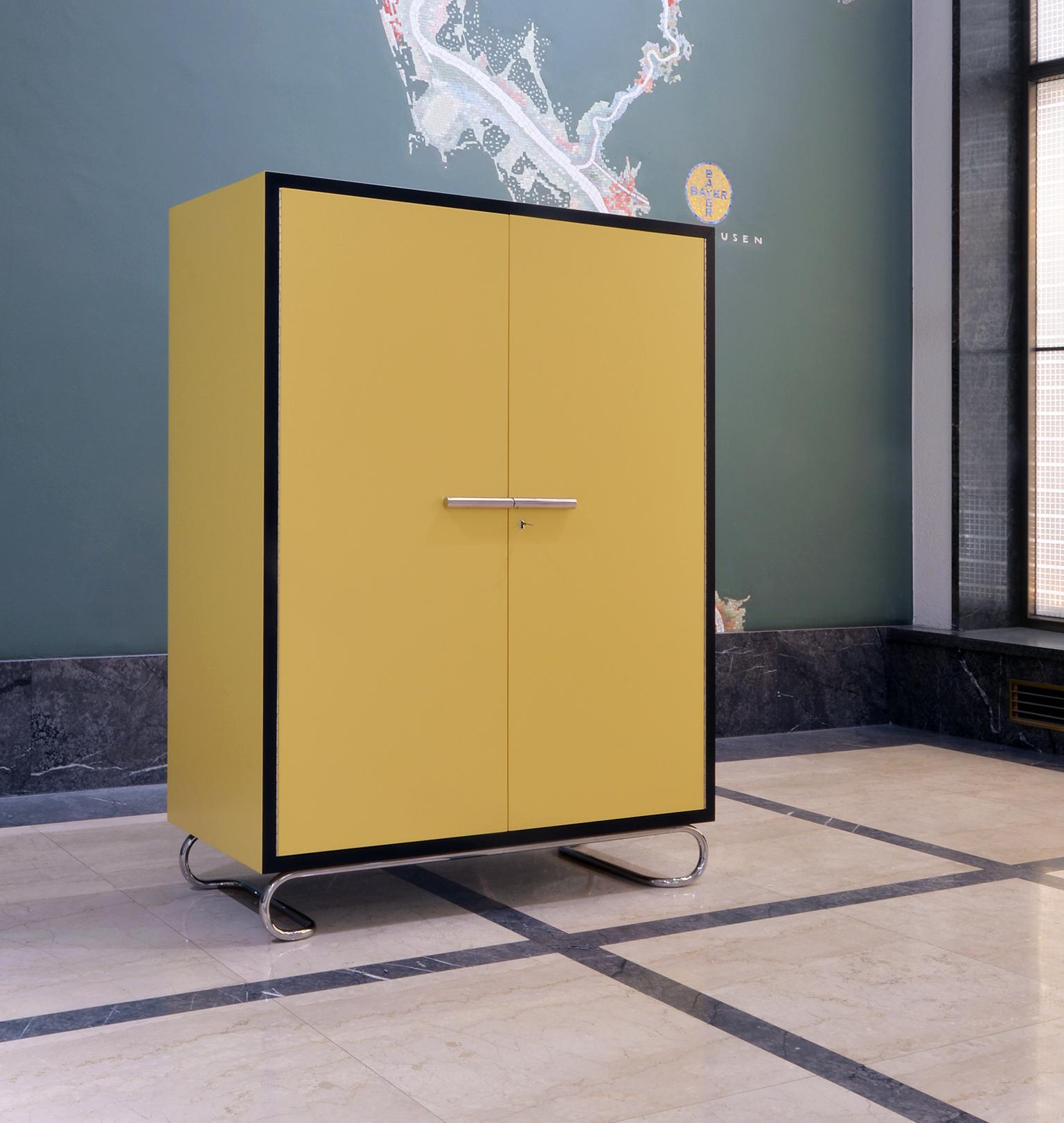 https://a.1stdibscdn.com/bespoke-modernist-storage-cabinet-in-lacquered-wood-and-tubular-steel-hardware-for-sale-picture-2/f_19723/f_465581021757169711655/6_master.jpg