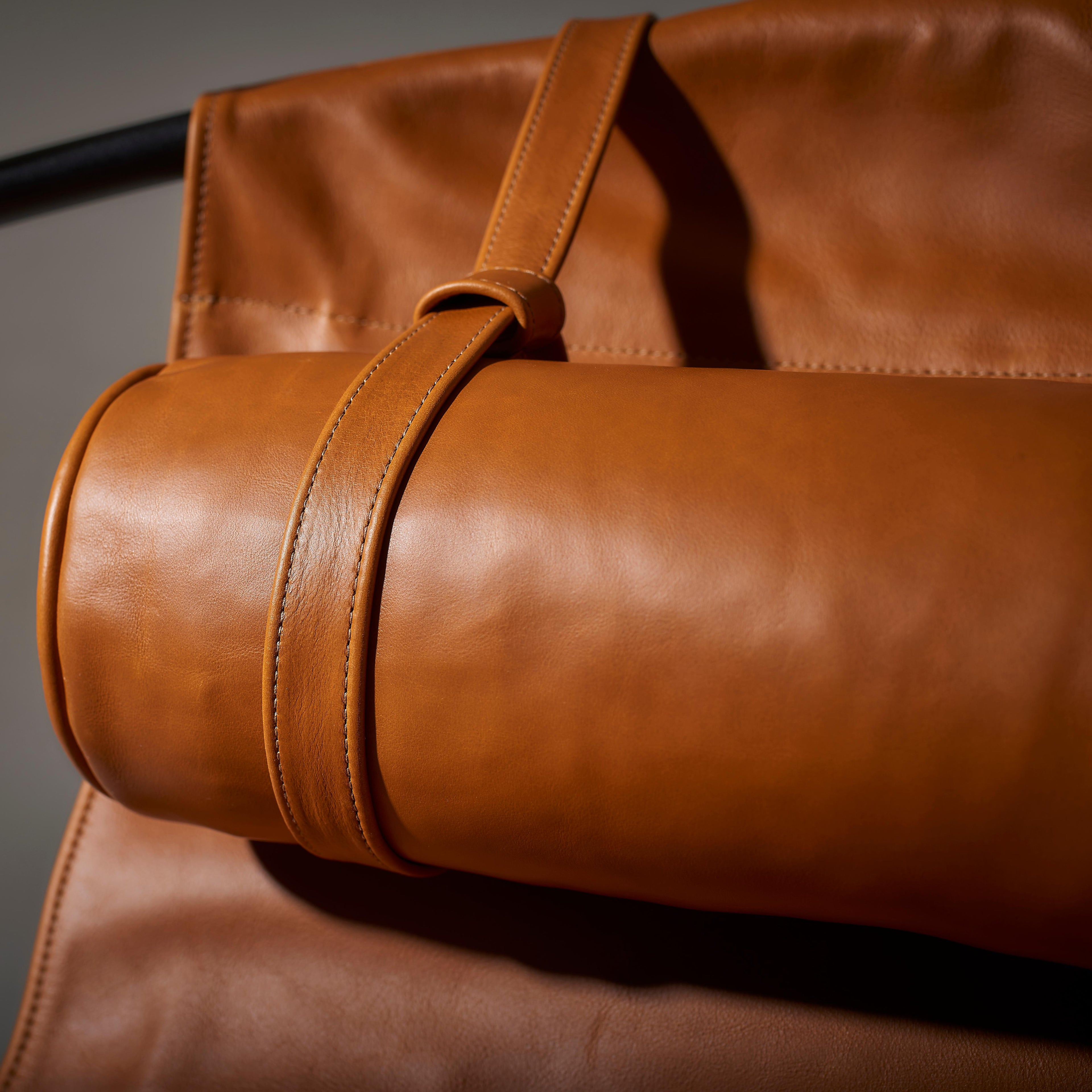 https://a.1stdibscdn.com/contemporary-genuine-leather-mild-steel-hanging-sling-chair-in-brown-ochre-for-sale-picture-8/f_32773/f_312695521668169578909/6b_Sling_hanging_chair_swing_seat_OCHRE_master.jpg