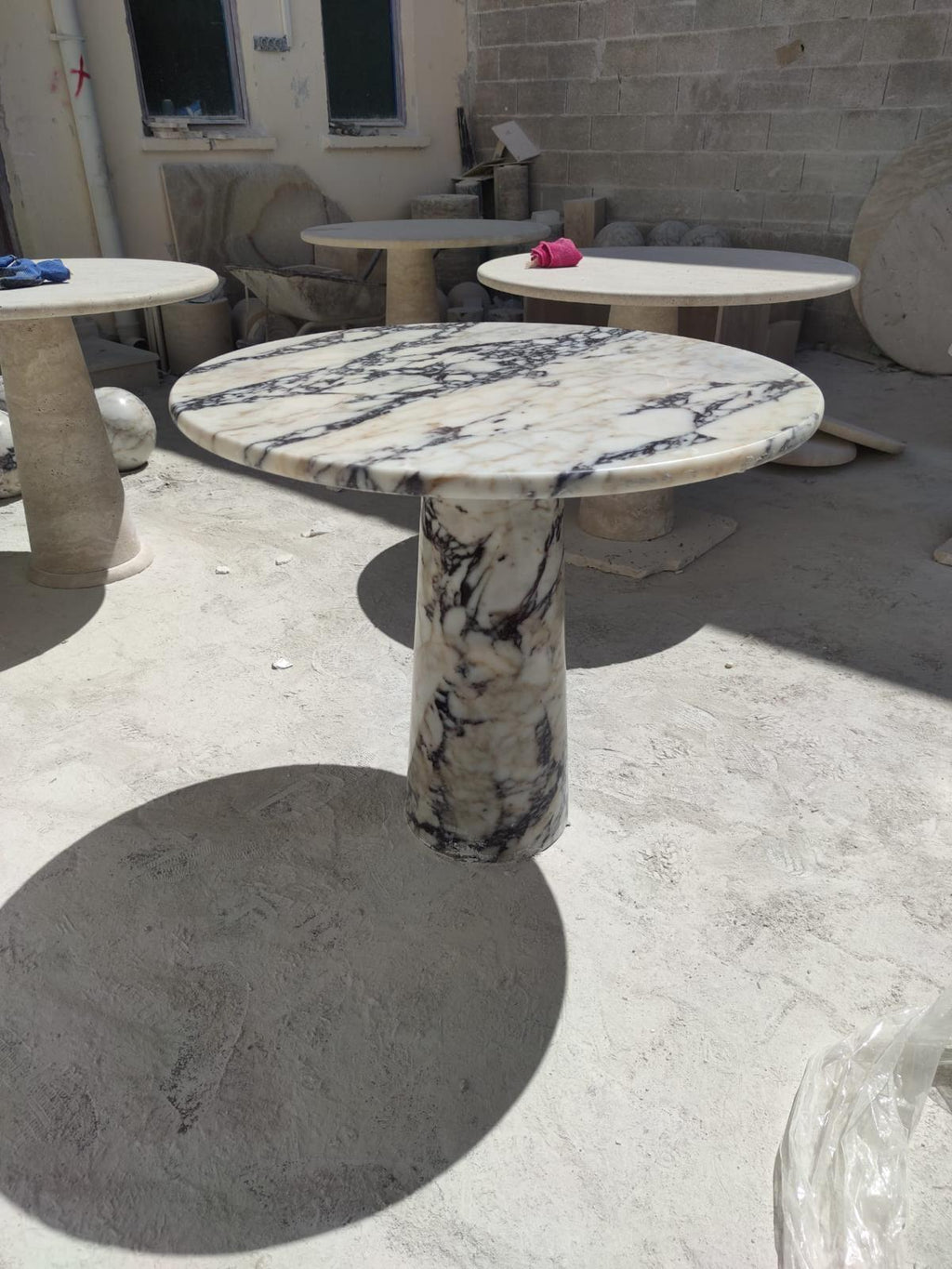 https://a.1stdibscdn.com/viola-veined-round-dining-table-in-the-style-of-1970-angelo-mangiarotti-for-sale-picture-2/f_80522/f_409987221723143387867/72525236_d604_447c_971d_35b9f0877eba_master.JPG