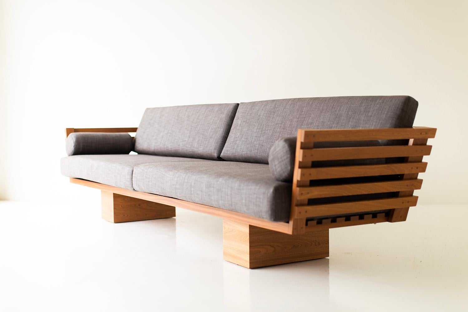 https://a.1stdibscdn.com/large-outdoor-slatted-suelo-sofa-for-sale-picture-2/f_9720/f_363717821696275686684/73573469_outdoor_slatted_sofa_30410532_master.jpg