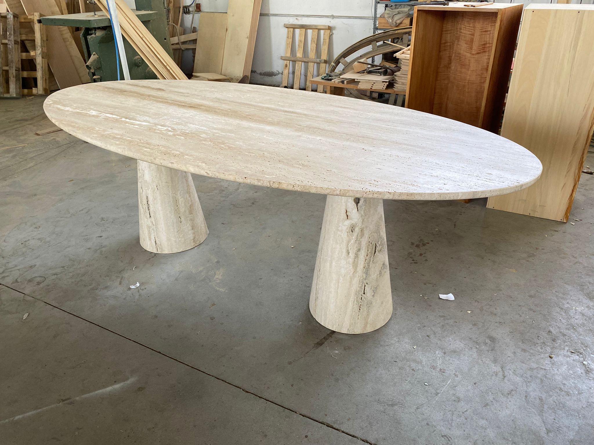 https://a.1stdibscdn.com/bespoke-italian-travertine-oval-dining-table-for-sale-picture-10/f_47872/f_452299121748527446925/74639c6f_0ecb_4896_848a_6d8b690d7c1a_master.jpeg