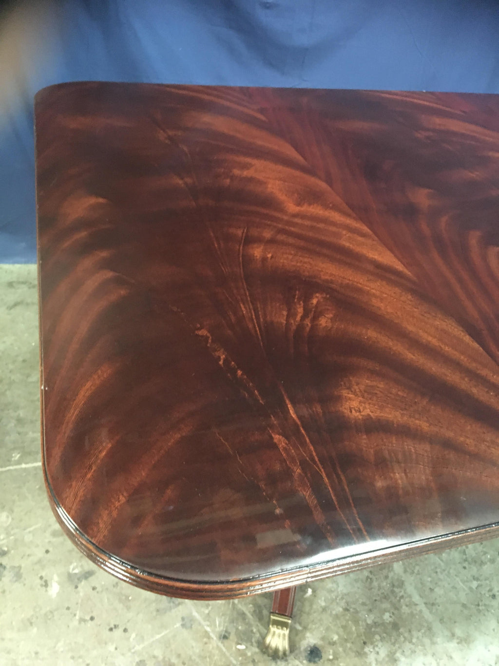 https://a.1stdibscdn.com/custom-large-crotch-mahogany-georgian-style-dining-table-by-leighton-hall-for-sale-picture-5/f_44162/f_15299341/7470CF53_0D05_424B_8C10_1561984616267_master.jpeg