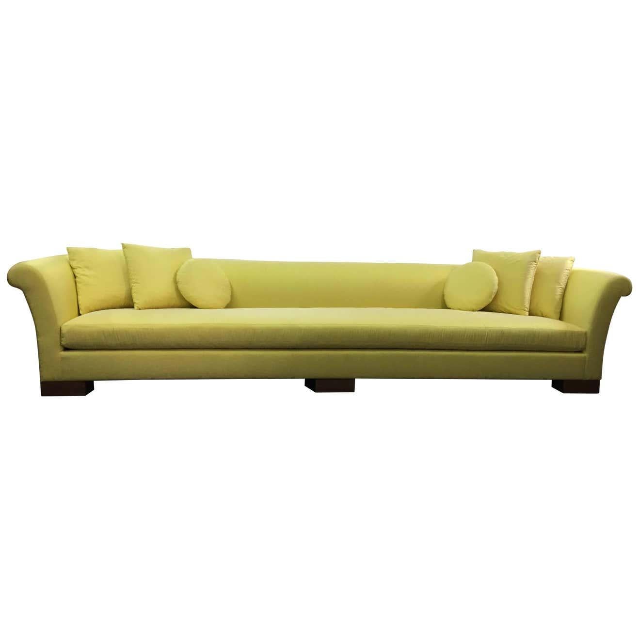 https://a.1stdibscdn.com/elegant-divan-in-lemon-satin-with-square-and-round-pillows-for-sale-picture-4/f_7815/f_76135331638821044142/7613533_master_1__master.jpg