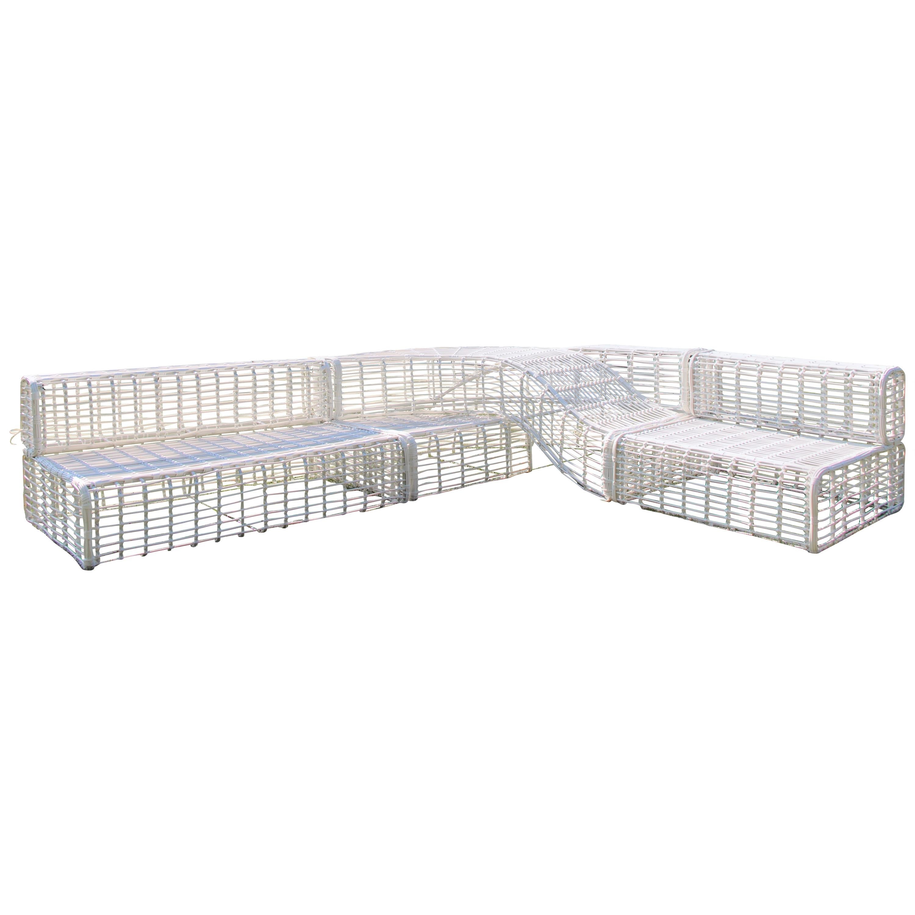 https://a.1stdibscdn.com/modular-contemporary-outdoor-wicker-sofa-lounger-with-integrated-daybed-for-sale/1121189/f_78697931596841508859/7869793_master.jpg