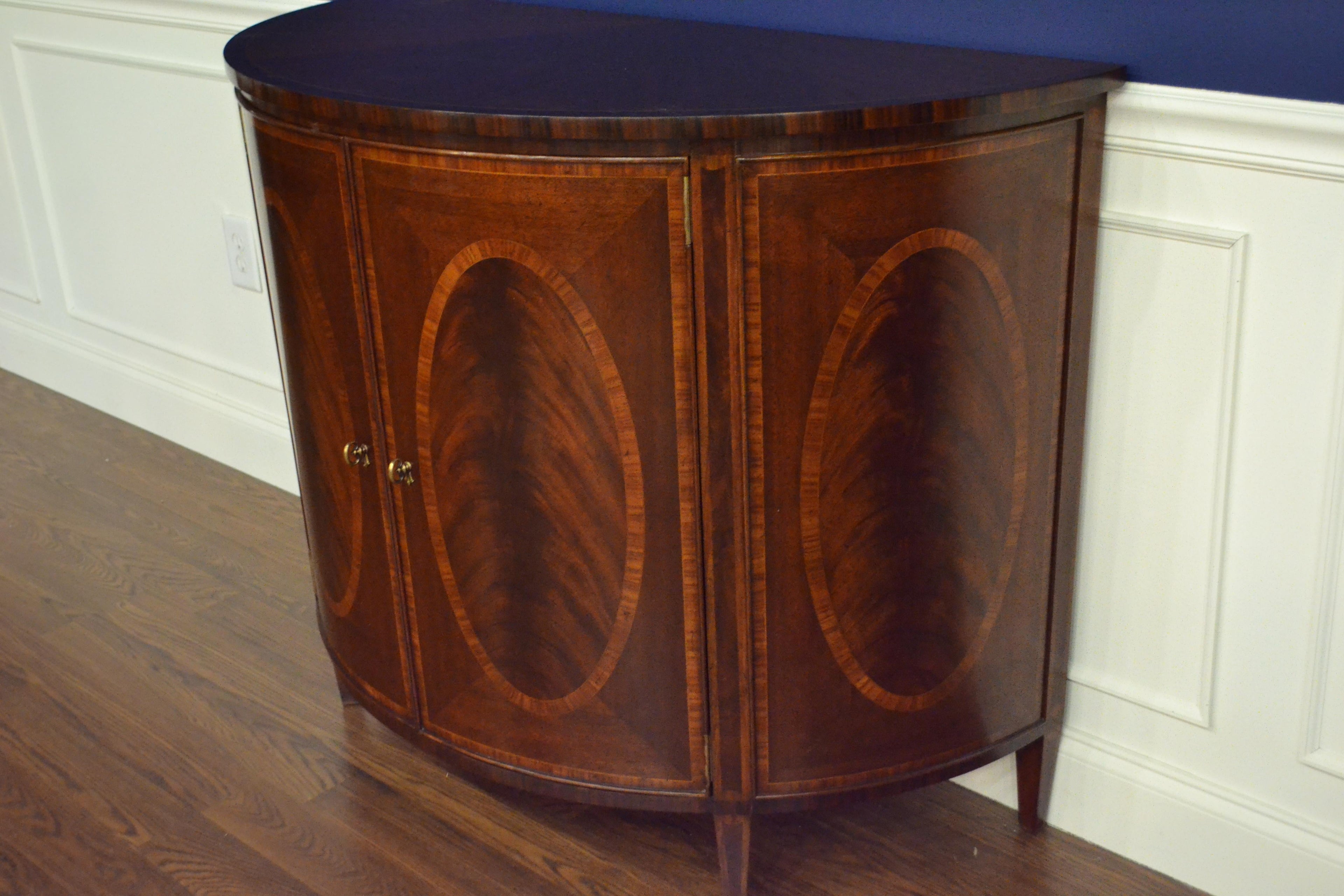 https://a.1stdibscdn.com/hepplewhite-style-mahogany-demilune-cabinet-by-leighton-hall-for-sale-picture-8/f_44162/f_154696221563149720735/7E0E3D9E_7653_46B0_9E54_487492CC1E3B_master.jpeg